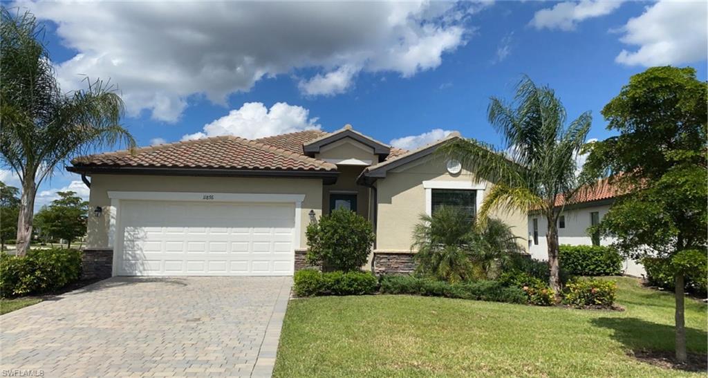 No need to wait to build! Like new 2019 Trevi model on a rare CORNER LOT and almost a quarter acre of land ready for immediate occupancy!  Extra yard space compared to other homes in the community, along with the gorgeous lake view in the back from your screened lanai. The 4 bedrooms and 3 full baths 2032 sq ft. floor plan offers split bedrooms for privacy.   Features beautiful white kitchen with upgraded granite, lights, stainless appliances and open to large living/dining area, tile in all areas except bedrooms.  Arborwood Preserve is a vibrant gated community with a tropical oasis “Town Center” with resort-style amenities: expansive lagoon-style pool, outdoor dining/bar, complimentary coffee shop/lounge, craft/card rooms, theater, fitness center, aerobics/yoga studio, community room, full-service spa, bike and jog paths, plus sports courts for tennis, pickelball & bocce. On site HOA Office.  Home is a short walk to “Town Center “.  Arborwood is located minutes from FGCU, Red Sox & Twins training stadiums, shopping, dining and RSW.  No Flood Insurance required.  Washer and dryer included.