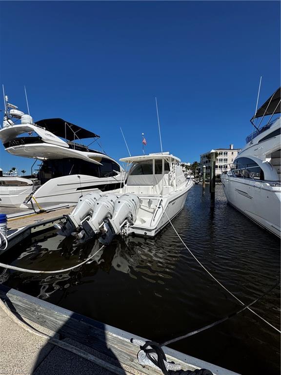 Dock Slip D-3 measuring 60' with a 17.6 foot beam is located in at Gulf Harbour Marina.  Now available for purchase or lease—an exceptional opportunity to secure one of the most desirable slip locations in Southwest Florida. Lease $1,200 per month. 

Why D-3? Positioned just steps from the marina parking area, D-3 offers unmatched convenience for effortless boarding, provisioning, and unloading. Its premier location allows owners and guests to step directly from vehicle to vessel, maximizing time on the water and minimizing hassle.

Beyond convenience, this slip offers peace of mind. During Hurricane Ian, vessels in this protected marina basin experienced exceptional protection, thanks to Gulf Harbour's unique location behind barrier islands and within a naturally sheltered harbor. Gulf Harbour Marina is widely recognized as one of Southwest Florida's most protected deep-water marinas.

Gulf Harbour Marina features 186 state-of-the-art floating concrete slips with direct access to the Intracoastal Waterway and the Gulf of Mexico. Marina amenities include shore power, potable water, pump-out service, fuel dock, professional dock staff, and full-service marina operations.

Owners enjoy access to the marina clubhouse, where breakfast, lunch, dinner, and cocktails are served in a waterfront setting overlooking the harbor and your vessel. The community also benefits from 24-hour staffed security, providing an added layer of protection for both your investment and your boating lifestyle.

From this premier location, enjoy convenient access to Sanibel, Captiva, Fort Myers Beach, world-class fishing grounds, and some of Florida's most sought-after cruising destinations.

Whether you're seeking a secure home port for your vessel, a strategic boating investment, or the convenience of one of the marina's most accessible slips, Dock Slip D-3 represents a rare opportunity within the prestigious Gulf Harbour waterfront community.