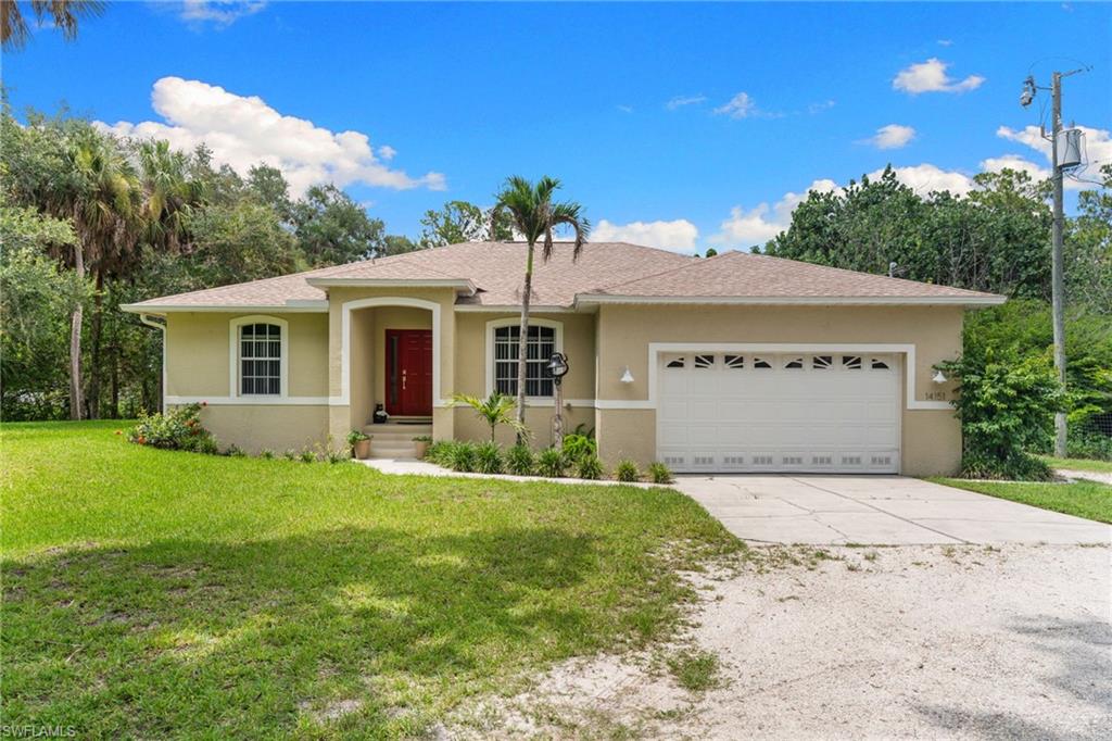 This home is in a BEAUTIFUL SETTING.  It's tucked back into a grove of large oak trees, in the very sought after Buckingham area!  This gorgeous home offers 3 bedrooms, 2 baths, 2 car garage and a screened swimming pool with a large lanai and screen room.  The split floorplan is perfect for families with kids and guests. The large kitchen has an island with breakfast bar and eat in dining area, all covered in beautiful granite. The kitchen opens up to the sizeable family room, with a great view of your pool, lanai,and screen room. The primary bedroom and formal dining room, also open to the pool area! The home sits on an acre of land and features a huge 30 ft X 32 ft work shop, with electric and epoxied floors, with16 ft walls. The mezzanine storage goes full length, it offers HUGE storage. The work bench goes almost full length as well. This shop will handle hobbies, equipment, welders, etc. The HUGE overhead roll door can accept boats, RV's and most other vehicles.
Properties such as this rarely come up for sale in Buckingham, so it's a must see and tour!