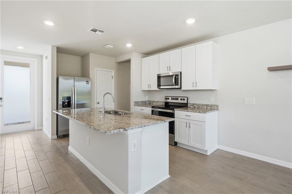 AVAILABLE FOR ANNUAL LEASE – ELECTRIC BILL INCLUDED!
Enjoy carefree living in this beautifully maintained 3-bedroom, 2-bath home in the desirable Crescent Lakes neighborhood of Babcock Ranch. One of the biggest advantages of this rental is that the owner pays the electric bill, saving tenants hundreds of dollars each month thanks to the home's paid-off solar system and Tesla Powerwall.
Designed for comfortable everyday living, this home features a bright open-concept floor plan with a spacious kitchen overlooking the living and dining areas, making it perfect for relaxing or entertaining. The split-bedroom layout provides privacy, while the generous primary suite offers a peaceful retreat with an en-suite bath. Enjoy the tranquility of your own private backyard. The home is equipped with a paid-off solar system and Tesla Powerwall, providing exceptional energy efficiency and backup power. Electric vehicle owners will also appreciate the convenience of charging at home. Located just steps from the Crescent Lakes community pool, pickleball and basketball courts, playgrounds, and walking trails, you'll also enjoy easy golf cart access to everything Babcock Ranch has to offer, including restaurants, coffee shops, grocery stores, fitness centers, parks, lakes, farmers markets, concerts, food truck rallies, and countless community events throughout the year. Families will appreciate the highly rated K-12 neighborhood school, while outdoor enthusiasts will love the miles of nature trails, dog parks, and green spaces. This is a rare opportunity to lease an energy-efficient home in one of Southwest Florida's most desirable master-planned communities while enjoying significant monthly utility savings.
Please note: This property is currently listed for sale. However, once an annual lease is executed with a qualified tenant, the property will be removed from the sales market for the duration of the lease.
Schedule your private showing today and experience everything Babcock Ranch has to offer.