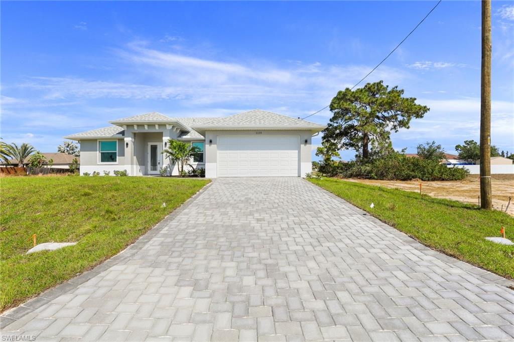 DON'T WAIT!! **Complete by September 2021** Welcome to NW of Cape Coral, one of the fastest growing areas in the beautiful city of Cape Coral !! This wonderful modern open concept, brand new Single Family Home "Santa Fe Model" features nearly 1,550 Sq. Ft of living space, 3 large bedroom , 2 Full new bathrooms with Quartz, 2 car garage . Freshly painted inside and out, epoxy in garage, new kitchen with soft-close cabinets, Quartz counter tops, island, new stainless steel appliances, new 8 foot tall doors, new based boards, new AC system, new light fixtures, new plumbing, new smoke detectors, alarm system new water heater, new well equipment. Home is equipped with Taex built-in pest control system, irrigation system, hurricane impact doors and windows, laundry room, Spacious master bedroom, new master bath, double-sink, 1 huge walk-in closet, new plank tile throughout the home. The location is close to many of Cape Coral top schools, closer to US 41, North Fort Myers, hospitals, shopping, dining, entertainment & less than 30 mins to SW Florida International Airport, NO HOA Fees. This home will not last! Photos are for illustrative purposes and should never be relied upon.