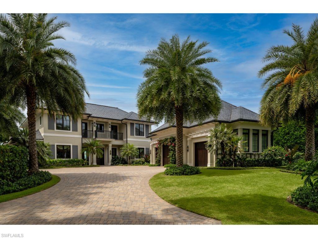 Sensational vistas overlooking Naples Bay and the entrance to the southern waterways beyond! Graciously situated on resplendent grounds with approximately 145 feet of water frontage per the plat and/or deed on one of the most desirable streets in Port Royal - Nelson’s Walk. Built in 2016 to exacting standards by The Williams Group, Inc., the home incorporates luxurious modern amenities, indoors and outdoors. Striking in its attention to detail, the immaculately maintained home features stunning light-filled rooms and an extremely well conceived configuration. Particular attention was paid to great room spaces as well as cozy and private retreats. The first floor accommodations include the primary suite with separate his and her bathrooms and closets, a guest suite, great room, kitchen, large butler’s pantry, den, and an office. The two upstairs guest suites each feature ensuite baths and each is also accompanied by an additional “bunk room.” Oversized 3 bay garage. The large pool deck and covered outdoor living area enjoy some of the very finest views in all of Naples! Port Royal Club Membership eligibility.