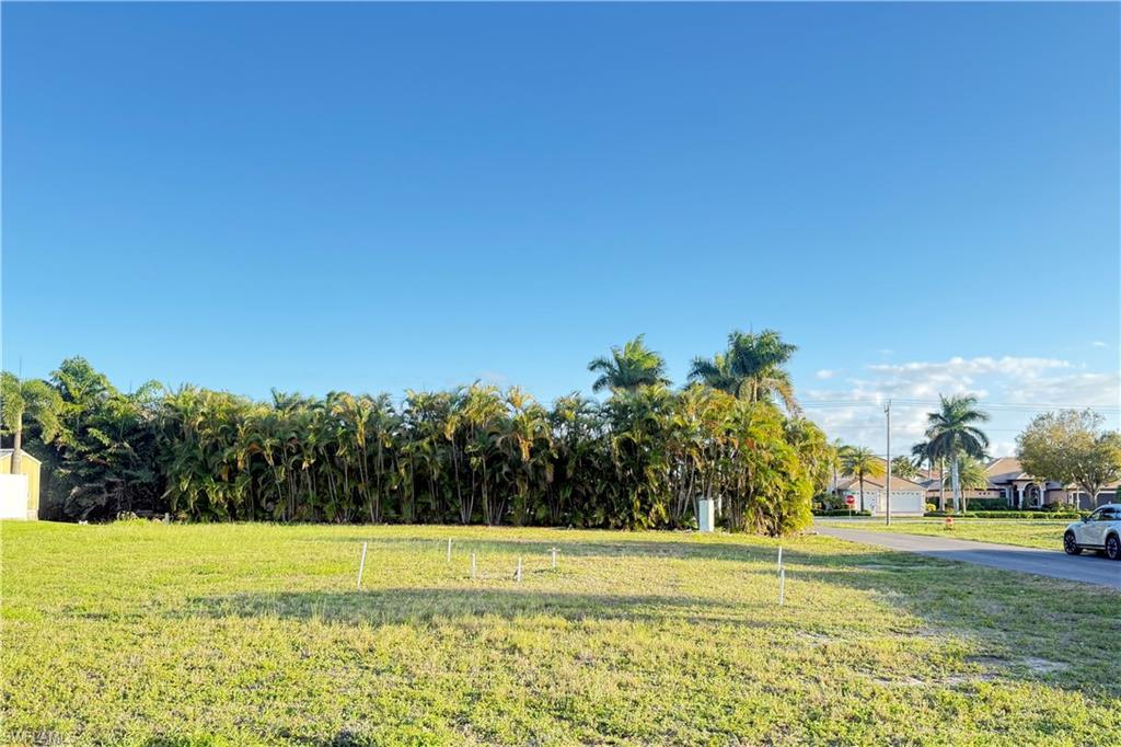This corner lot is in an upscale area surrounded by beautiful homes. Located in Southwest Cape Coral and just a quick walk to the gorgeous Cape Harbour Marina, with great restaurants, shopping, boating services, and more.