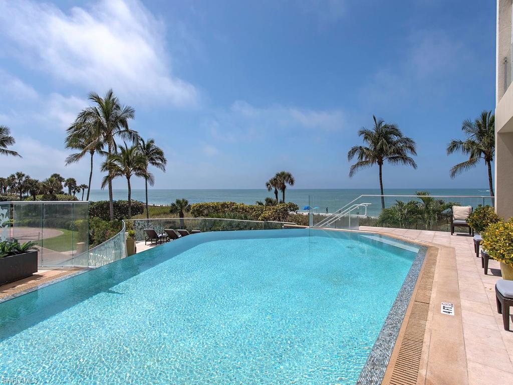 C.12194 - Dramatic never-ending, uninterrupted views of the Gulf. Water views from every room! Only 28 residences in this intimate building situated directly on the beach in prestigious Naples Cay. Four bedrooms plus family room, four baths in this spacious home encompassing 4,950 square feet. Conveniently located within walking distance of fine dining and upscale shopping at The Village on Venetian Bay and Waterside Shops.