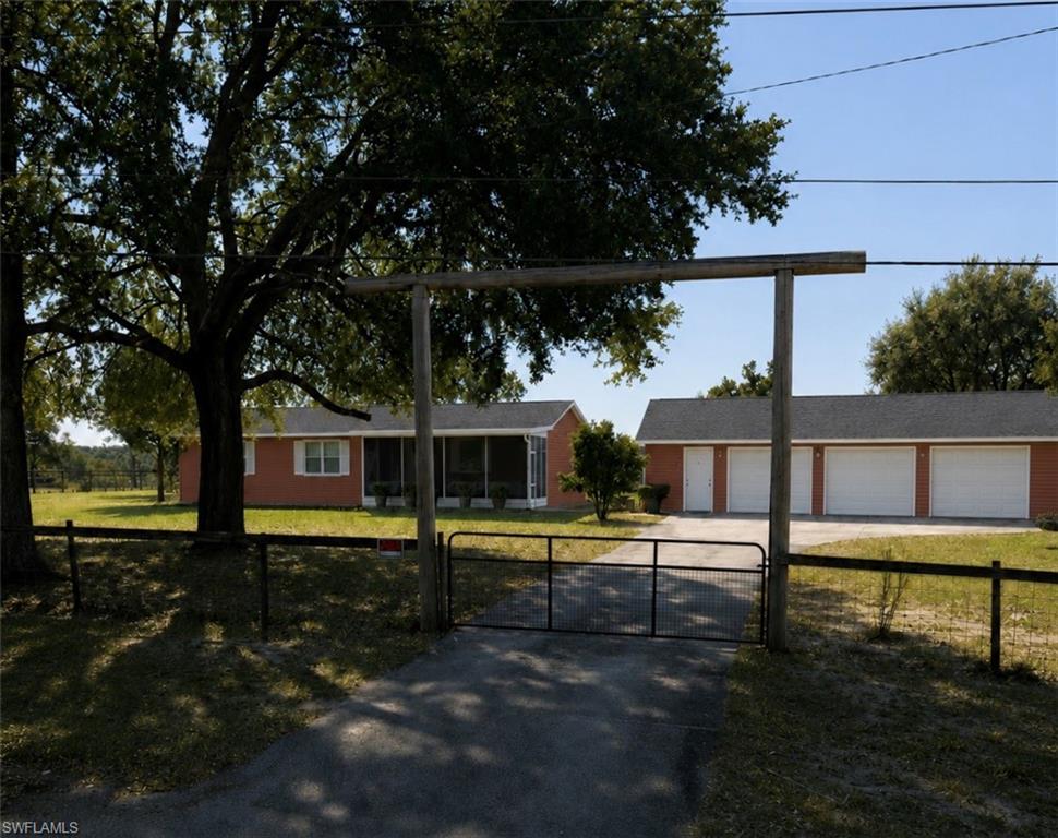 Escape to the peaceful countryside with this beautiful 3-bedroom, 2-bath manufactured home nestled on 5.13 acres in desirable Weirsdale, Florida. Offering 1,512 square feet of comfortable living space, this property combines rural charm with plenty of room to spread out and enjoy nature.

The home features a spacious layout with a welcoming living area, a functional kitchen, and a split-bedroom floor plan designed for comfort and privacy. Outside, you’ll find a rare detached 3-car garage, providing ample space for vehicles, equipment, hobbies, or extra storage.

With over 5 acres of land, the possibilities are endless—bring your animals, start a garden, park your RV or boat, or simply enjoy the privacy and tranquility of country living. Conveniently located near The Villages, Ocala, and local lakes, this property offers the perfect balance of seclusion and accessibility.

Don’t miss this opportunity to own your own slice of Florida paradise!