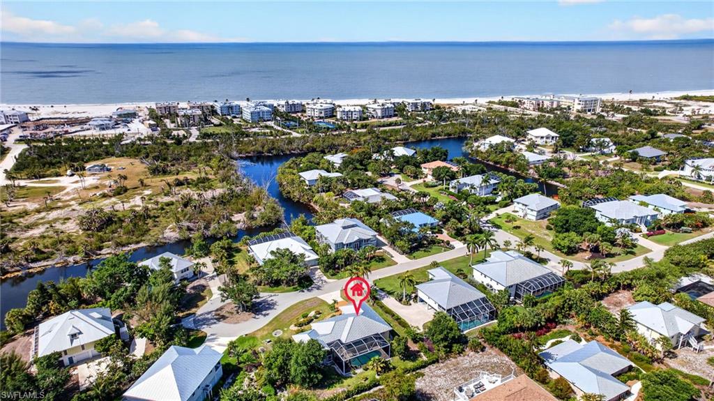 A seamless blend of coastal charm and modern luxury, this stunningly remodeled elevated Michigan home offers the ultimate Sanibel Island lifestyle just steps from the sugar-white sands and turquoise waters of the Gulf. Featuring 3 bedrooms, 3 bathrooms, and a beautifully designed open-concept floor plan, this exceptional residence has been thoughtfully updated from top to bottom to create a bright, airy retreat that perfectly captures the essence of island living.
From the moment you arrive, the home’s inviting curb appeal, tropical landscaping, and elevated design set the stage for your private slice of paradise. Inside, soaring ceilings and walls of windows fill the spacious interior with natural light, while the seamless flow between the living, dining, and kitchen areas creates an ideal setting for both entertaining and everyday comfort. Every detail has been carefully curated with upgraded finishes, modern touches, and timeless coastal elegance throughout.
The beautifully remodeled kitchen serves as the heart of the home, offering stylish cabinetry, quality appliances, generous counter space, and an effortless connection to the main living areas. Whether hosting family gatherings, enjoying quiet evenings at home, or welcoming guests after a day at the beach, this thoughtfully designed layout makes every moment feel relaxed and inviting.
The spacious primary suite provides a peaceful sanctuary with a beautifully updated bathroom and tranquil views of the lush surroundings. Additional guest bedrooms and baths offer comfort and privacy for family and visitors alike, making this home perfectly suited as a full-time residence, seasonal getaway, or income-producing investment property.
Step outside into your own tropical oasis where a sparkling private pool is surrounded by swaying palms and mature landscaping, creating the perfect setting for soaking up the Florida sunshine. Expansive outdoor living areas provide plenty of room for lounging, dining, and entertaining after long days spent shelling, biking, boating, or enjoying Sanibel’s world-famous sunsets.
Located just a short stroll from the beach, this home offers the rare opportunity to enjoy the very best of island life while still providing privacy, comfort, and peace of mind in an elevated design. Whether you are searching for a luxurious vacation retreat, a serene primary residence, or a strong investment opportunity, this beautifully renovated home checks every box.
Experience the magic of Sanibel Island where breathtaking beaches, abundant wildlife, scenic bike paths, and a laid-back coastal lifestyle come together in one extraordinary destination. This is more than just a home — it is your opportunity to start living the island dream and experience “Selling Sunshine” at its finest.
