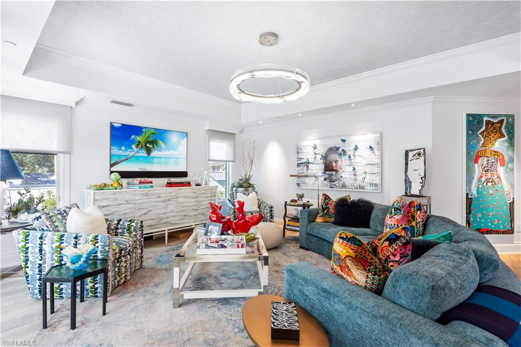 Anything but typical, this stunning Olde Naples property has been completely renovated, and the layout masterfully reimagined by Stofft Cooney Architects and Carrie Brigham Design. Described as “a design that liberates the soul”, the residence can be likened to a work of art, which in fact was the inspiration. Finishes include Legno Bastone wide plank flooring in the Vienna finish, large kitchen island with an Opala quartzite top offsetting the white gloss custom cabinetry, hand-cut glass backsplash, custom flooring detail in the study, an opulent master bath with Azul calcite countertops and marble-like porcelain tile floors. The well-equipped epicurean kitchen features an integrated Subzero refrigerator, refrigerator drawers, wine storage, and Wolf induction cooktop. At just over 4,500 sqft the residence spans the entire 2nd-floor offering generous living space that includes 3-bedrooms plus a den, 3.5-baths, expansive family room, lanai overlooking the pool, private elevator, and 2-car garage. The home is spectacularly located within walking distance of the beach and pier as well as fine shopping and dining at 3rd Street South and 5th Avenue.