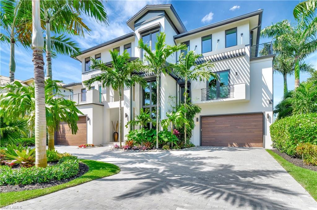 NEW PRICE!! Panoramic views of the Gulf of Mexico and incredible sunsets. Gulf-front 3-story contemporary, 6 bedroom, 6 1/2 bathroom plus den, turn-key, fully furnished with impeccable finishes, 2 deluxe main suites and living areas on separate floors. Essence of privacy awaits with 3-sided, no build land and professionally mature landscaping. Located in charming and prestigious Hideaway Beach, the highest standards in luxury and comfort await as bamboo floors and wood beams add warmth to the infusion of natural light-filled interiors. Tall entry screened doors set the main level stage for full Gulf of Mexico water views that stretch across horizon with legendary Marco Island sunsets. Great room seamlessly blends state-of-the-art kitchen, quartz countertops, gas and convection stove and double deluxe pantries with dining and living room built-ins. Spacious main bedroom with ensuite, large shower, 2 sinks, 2 windows; walk-in closet, sitting area, extra den with ensuite, water views. Unparalleled opportunity for entertaining with middle level bedrooms with ensuite retreats including high-end bath fixtures; laundry room with sink and cabinets; hot tub. 1st floor apartment with kitchenette, bath, porcelain countertops, W/D, living room; private pool with area for lap swimming. Rooftop sundeck has panoramic views including Marco Island skyline. Extra’s include whole house generator; elevator; tray ceilings throughout; Smart home Control4 and Leviton systems; impact windows; instant hot water with tankless water heater; 2 garages for 4 cars with lifts (up to 6,000 lbs.); large AC storage room. Hideaway Beach offers an unmatched lifestyle with amenities: 24-hour gated community, golf and pro shop, tennis, bocce ball, pickleball, bike paths, fitness center, restaurants, on-site management and Hideaway Beach boardwalks, lagoons, shelling and fishing. Balancing a love of nature, desire for privacy and security, with being surrounded by luxury, your home will be in a west facing, waterfront haven that is a brief boardwalk to beach.