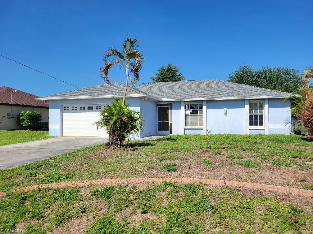 AMAZING DEAL on this 3BR/2BA home in NW Cape Coral with soaring cathedral ceilings and huge back yard with sprawling oak trees and plenty of shade! Home features tile floors throughout, soaring cathedral ceiling and split bedrooms! LOCATION..LOCATION just walking distance from major shopping area and other private services! Transform the backyard into a Tropical Oasis and enjoy the true Florida lifestyle! Don't delay-SCHEDULE a SHOWING TODAY!