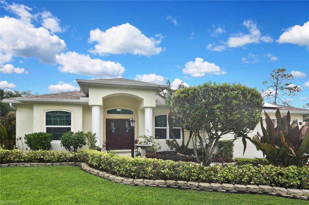 This triple corner oasis lot is the perfect year-round retreat for anyone including snowbirds!  This heated saltwater pool home has three-bedrooms, two bath home, 3 car garage (two attached and one detached) has been well maintained and updated. Some of the updates are newer roof, new floors, freshly painted both inside and out, updated kitchen, new impact windows, newer hvac system. The grounds come with a riding tractor in the detached garage that also has electric and a/c. The Solar Panels installed in 2022 makes your electric bill next to nothing. The house also is set up to add a generator. Make sure you admire the mature landscaping that includes multiple kinds of palm trees. The well is 120 feet deep. This home comes with a one-year home warranty for peace of mind.