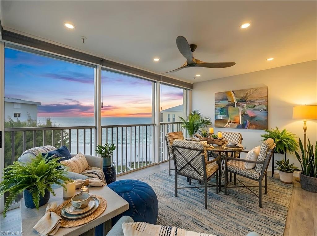 Sweeping Gulf Views in The Moorings! Perched on the top floor of St. Croix Club, this two-bedroom residence captures sunrise-to-sunset views with the soothing sounds of the Gulf just outside your windows. Inside, you’ll find a beautifully re-designed open kitchen with quartz countertops, stainless steel appliances, breakfast bar & under-cabinet lighting. An expanded living area with a dry bar makes entertaining easy.
The primary bedroom suite offers a cozy office alcove complete with a city view. An in-unit laundry, abundant storage & luxury vinyl flooring throughout are also part of this offering. With only two residences per floor, natural light pours in from three sides. St. Croix Club has completed exciting new amenities, including: a reimagined beachfront pool with extended deck, pergolas & social area, a new fitness center & redesigned social room. Additional conveniences include secured entry, under-building parking, and private storage. All of this is located just moments from the boutique shopping and fine dining of Venetian Village.