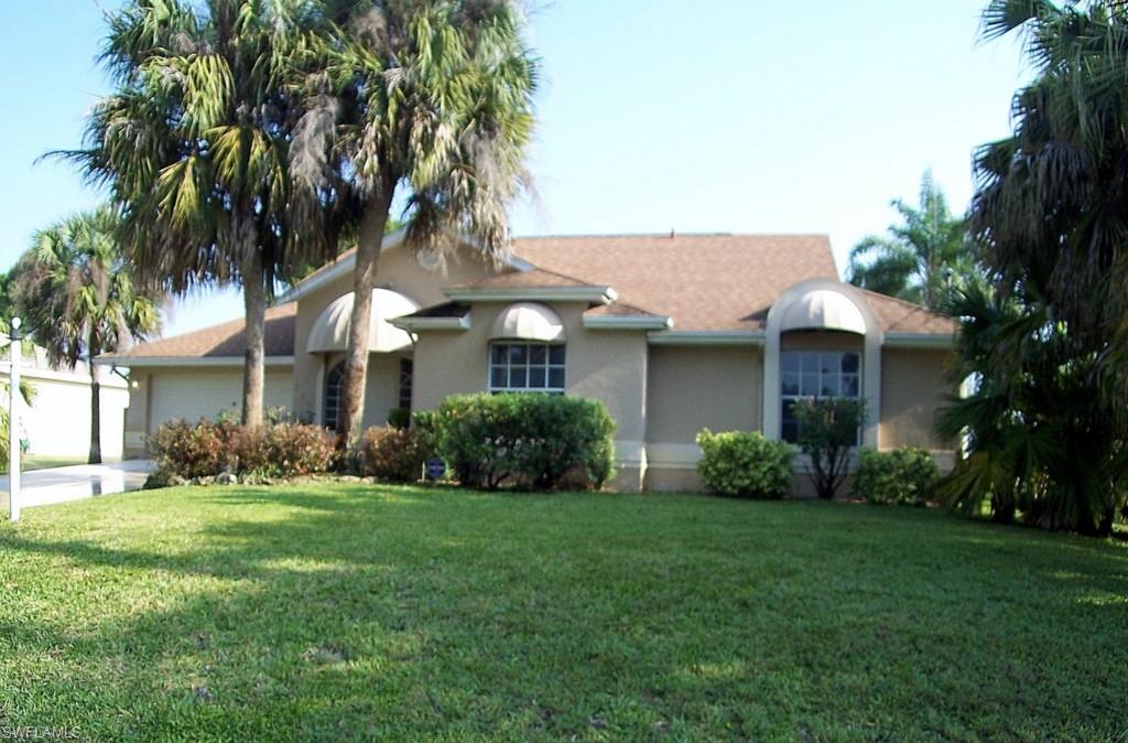 Magnificent upscale 3/2/2 home with so many extras you don't readily find at this price!
Tasteful, tropically landscaped grounds make this home a stand-out as compared to other "bare-lot" homes.
Features a very expansive rear pool deck area for relaxing and entertaining. Has heated in-ground pool and spa, along with raised adjoining  terrace. All enclosed by a Mansard roof screened pool cage, running full width of home. So much area is here for your Florida style entertaining!
Comes with all stainless kitchen appliances and washer and dryer  too!. All window treatments convey and furnishings are also separately available in sale of home. Both bathrooms have double vanity sinks. Guest bath has a high-end walk-in jetted tub/shower. Master bath has marble tiled/walled glassed in jetted tub and shower.
Home security system, electric garage door opener and auto irrigation system too.
Please see the attached Visual Tour to more closely see all this remarkable home has to offer.