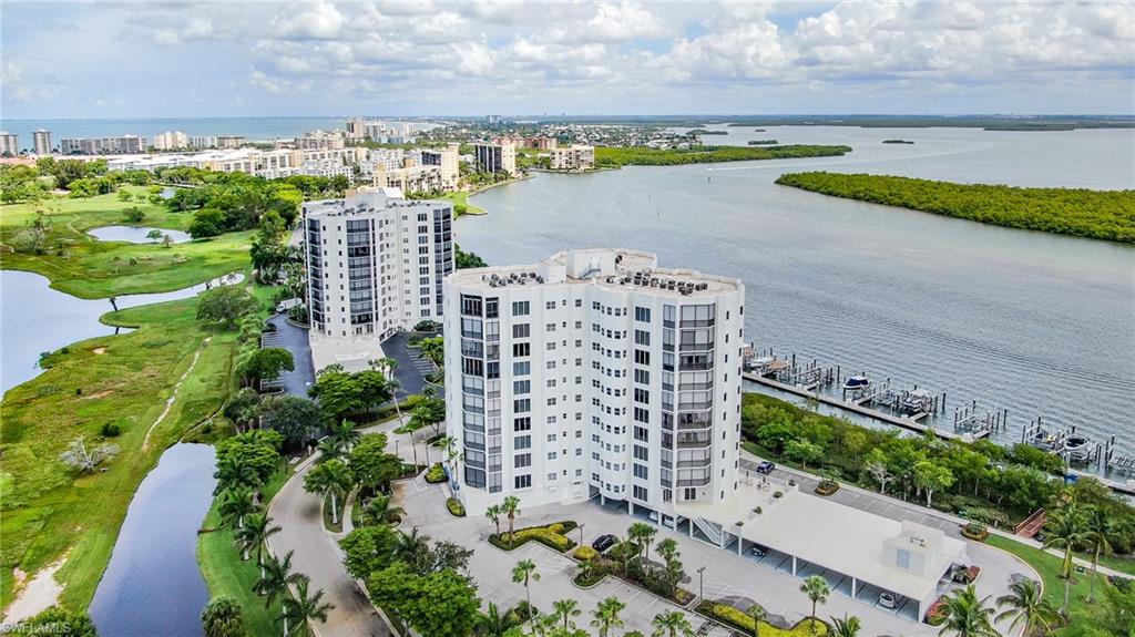 UNPARALLELED  VIEWS OF ESTERO BAY. VIEWS OF POOL, GOLF COURSE & GULF OF MEXICO TO THE SOUTH. Gorgeous wood cabinets, unique Fixtures and wall treatments. Amber glass tile backsplash and granite counter tops with stainless steel appliances. Designer Master Bath w/panoramic views! Porcelain tile flooring in living area. Electric Storm Shutters on lanai. Watch the dolphins & manatees from your living room, bedroom, master bath and lanai! Waterside has a luxury gated community with beach access and parking near by. Amenities incluyde pool/spa, fitness & social rooms, sauna's, guest suites, tennis courts, fishing pier, jog path and walk to shops, restaurants and golf course! Railings are new. No structural damage from hurricane Ian. Pool is been redone and no assessment coming up. Owner has a deep water dock / lift 12,000LB available only with unit at $80,000.00