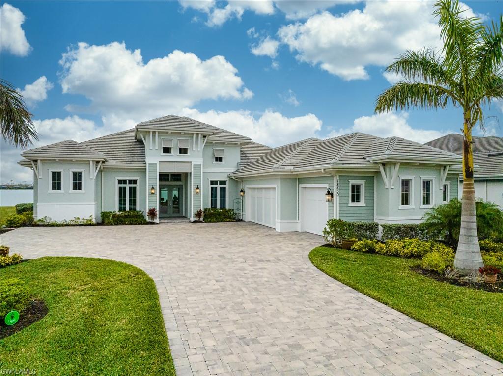 Just listed in time for season.  Welcome to the EXCLUSIVE 46 home peninsula section within WildBlue, all 46 homes build by Stock Development. Beautifully detailed 3985 SF home 4-bed/4.5 bath home with spectacular water and sunset views over the 600+ acre lake. Open family style layout with 2 Primary Suites plus 2 more guest bed/bath suites.  UPGRADES include custom designed kitchen with Thermador appliances and extra island storage, built-ins for office, wet bar, main closet drawers/shelving, Plantation shutters and motorized shades, High-end tile and countertops.  Entertain on your large panoramic super-screen lanai with saltwater pool & oversized spa, with outdoor kitchen.  Also, this home includes a whole house generator, extra-large 3 car garage (with added attic storage) and a private 2-lift dock for your boat & jet skis.  WildBlue community amenities include 8 pickleball courts, tennis, other sport courts and lap pool at the fitness center.  The newly opened Community Center with pool has outside dining (with full-service restaurant coming Oct 1).  WildBlue is located near the intern'l airport, FGCU campus and great shopping options.   GREAT home for family & friends to enjoy