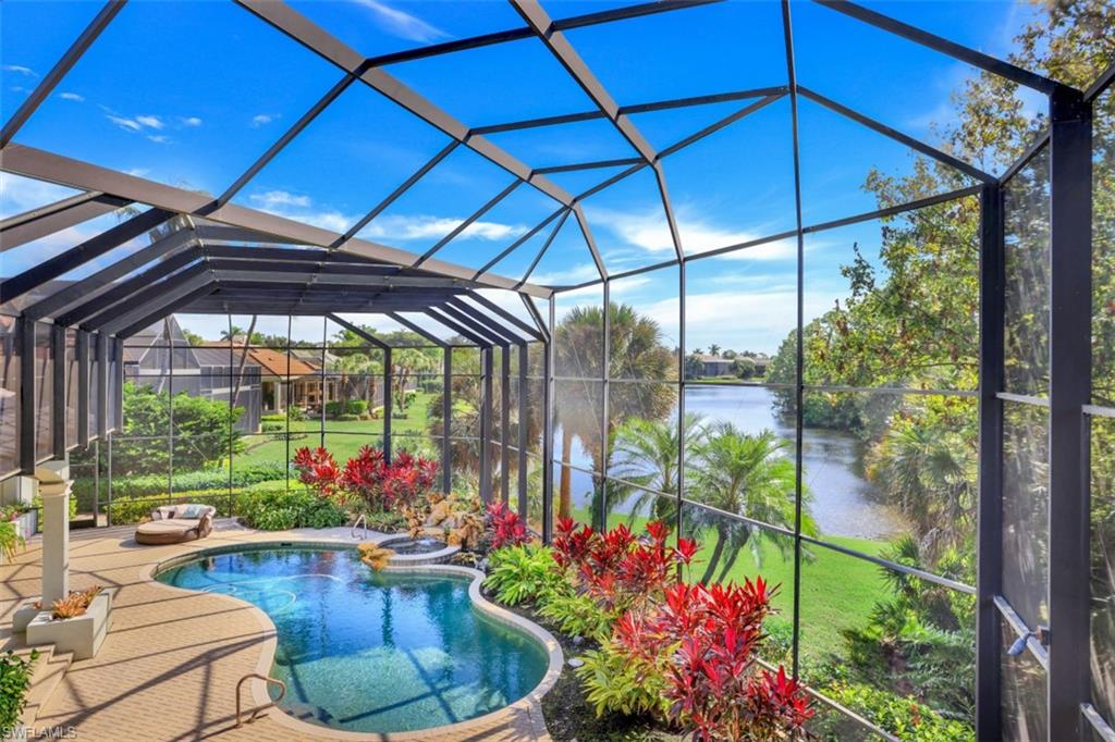 STUNNING Luxury Estate home on one of the LARGEST private lots in the exclusive Rookery Lake neighborhood of Bonita Bay!  With 5895 sq ft under air, it is perfect for those who wish to entertain on an impressive scale! Custom built by Harwick, this home has 4 bedrooms + den, bonus room with balcony and a 3 ½ car garage including an air conditioned storage room. Your eyes will be drawn to the southwestern lake views of the EXPANSIVE screened two story lanai with lush landscaping, lagoon style pool & rock waterfall spa. Inside the home, the soaring ceilings and ceiling treatments exude luxury. Offering exceptional entertaining, this home has an open island kitchen that overlooks the spacious family room, a butler’s pantry, wet bar and a temperature controlled 500-bottle wine room with “icynene” insulation.  The first floor master bedroom offers a sitting area & large walk in closet.  Most recent updates include updated kitchen with granite countertops, sinks and backsplash, carpet in bedrooms, flooring in baths, designer lighting throughout, new screens in pool lanai and a new roof installed in 2018. This home is true luxury, offering a highly desired open floorplan and an amazing lifestyle!