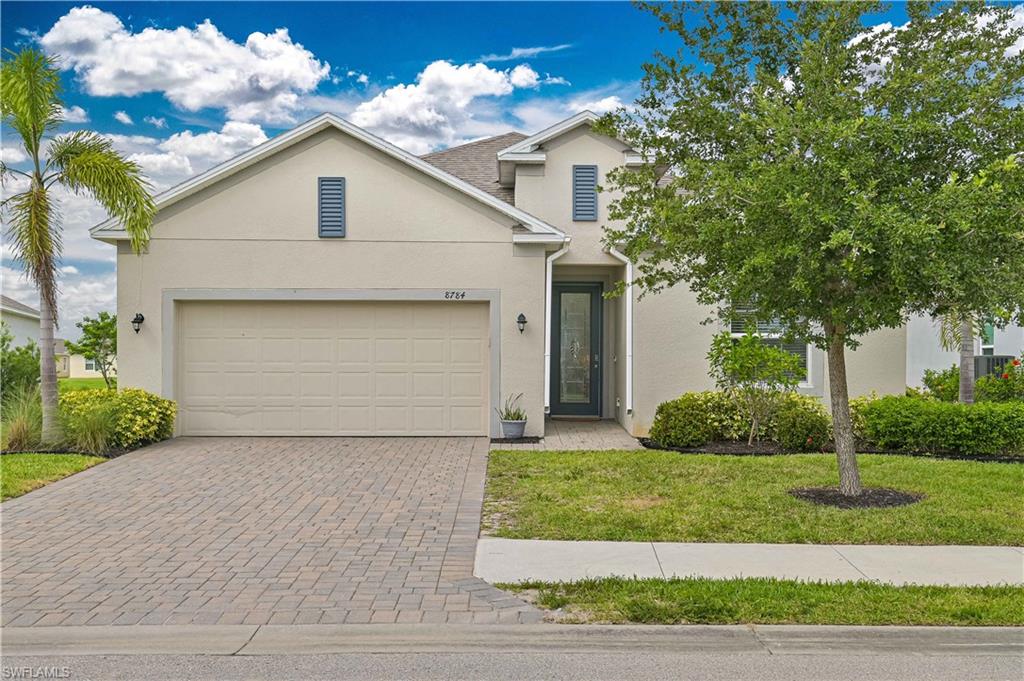 Now available in the highly sought-after Brightwater Lagoon community! This beautifully maintained 4-bedroom, 2-bath home with a 2-car garage offers the perfect blend of modern upgrades, comfort, and resort-style living.
Inside, you'll find an open and inviting floor plan featuring all-tile flooring throughout, creating a clean and cohesive look while providing easy maintenance. The kitchen has java shaker style cabinetry and an oversized island and is equipped with sleek Samsung stainless steel appliances, a stylish backsplash, and plenty of space for cooking and entertaining. The spacious primary suite offers a spa-like retreat with a frameless glass shower, while the additional bedrooms provide flexibility for family, guests, or a home office. Step outside to enjoy peaceful lake views from your fully fenced backyard—perfect for pets, outdoor gatherings, or simply relaxing and taking in the scenery.
Additional upgrades include EV chargers in the garage. Included is a ONE YEAR HOME WARRANTY for the new owner. Located in Brightwater, residents enjoy access to one of Southwest Florida's premier resort-style communities, featuring the spectacular crystal-clear lagoon and an array of recreational amenities like swim up bar, waterslides, splash pad, and more. Very low HOA fees include internet. This move-in-ready home offers an incredible opportunity to enjoy the Florida lifestyle you've been dreaming of. Schedule your private showing today!