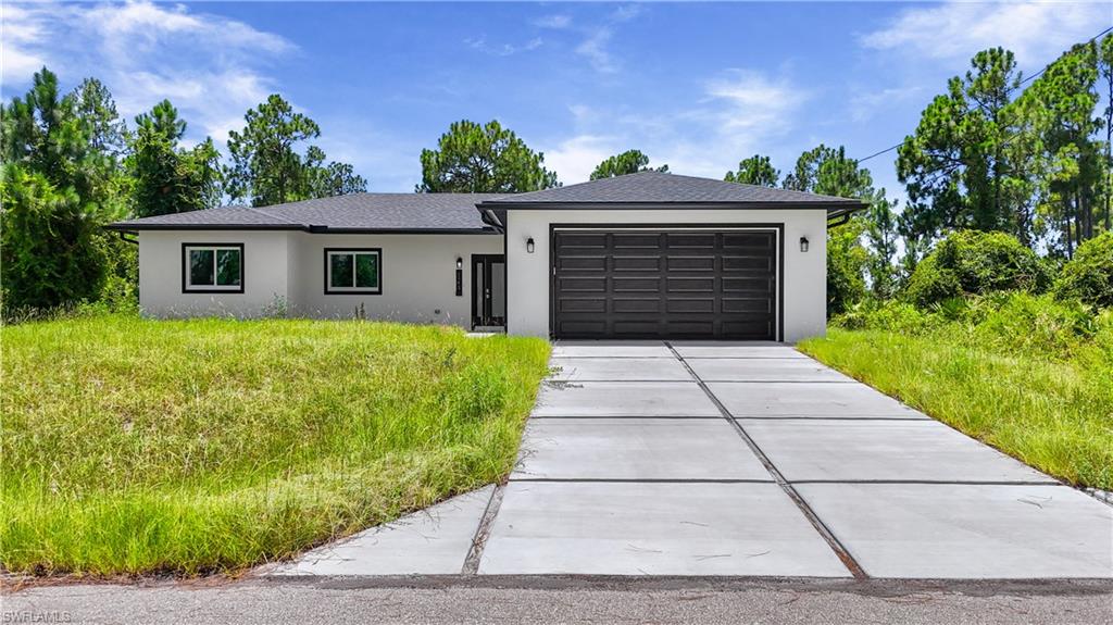 Welcome to this brand new 2026 built home offering 4 bedrooms and 3 baths (2 full, 1 half) across 1,632 sq ft of living space, set on a spacious .24 acre lot.
Inside, the kitchen is a true showpiece, featuring a massive waterfall edge island, sleek white cabinetry, quartz style counters, and a full suite of stainless steel appliances including a range, dishwasher, disposal, and self cleaning oven. It opens seamlessly into the great room and dining area, all finished with elegant tile flooring throughout.
The split bedroom layout offers privacy and flexibility, with a primary suite featuring a spacious walk in closet and an en suite bath with a glass enclosed shower, while the remaining bedrooms are thoughtfully separated, each with generous closet space.
Additional features include an interior laundry, and a covered lanai/porch overlooking the backyard. Impact resistant doors and sliding windows, and an attached 2 car garage.
Built for comfortable, low maintenance living, and located in a no subdivision setting in Southeast Lehigh Acres, this move in ready new build offers a great opportunity for buyers seeking modern construction with room to make it your own.