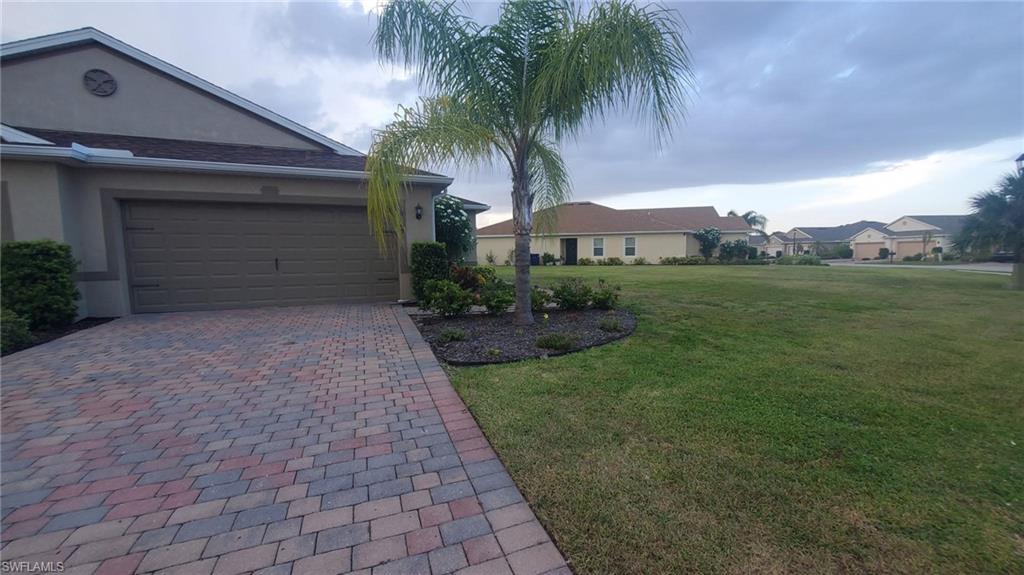 Owner will self-manage this clean as a whistle and FURNISHED UNIT with mostly wooden furniture. This is an ideal location with a school and Veterans Park right across the street, Dollar Store is at the entrance, banks and grocery stores are minutes away on Homestead Rd. Unit is move-in ready-moving should be easy as unit is already furnished. The den has a closet so this makes up  the 3rd bedroom. Tiles are everywhere, Laundry Room is under air. Note: you will have access to the Clubhouse where there is a pool and exercise room. NO NEED TO DO YARD WORK- this is maintained by the Community.  Unit can be shown with short notice. See remarks for the access into the community.