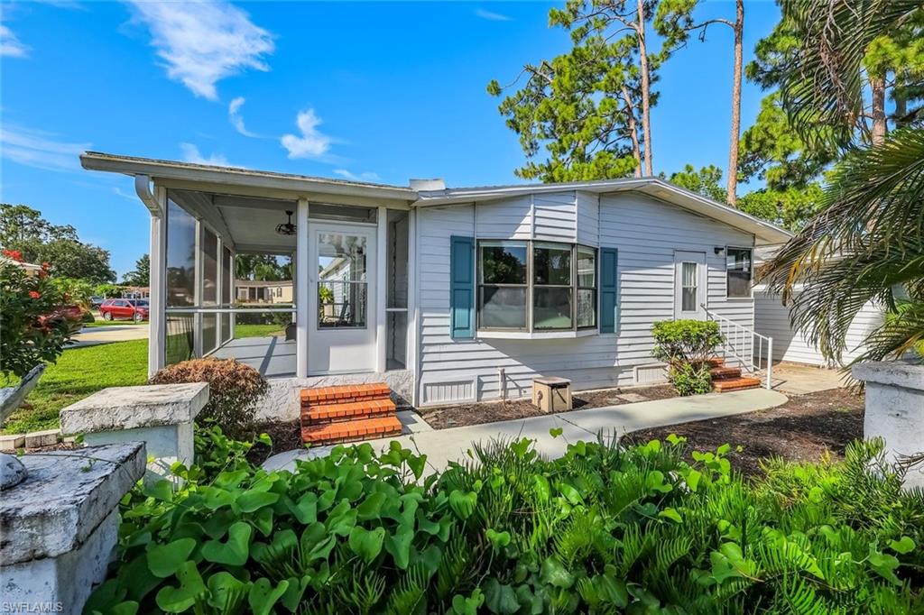 Own both the land and the home while enjoying the Florida waterfront lifestyle in this beautifully maintained, furnished ranch-style manufactured home, located in the highly desirable, guard-gated 55+ Pine Lakes Resort & Golf Community.

Perfectly situated on a premium lakefront lot with peaceful water views and scenic golf course vistas beyond, this move-in-ready home offers over 1,578 square feet of living space, a 1.5-car garage, 3 bedrooms, and 2 bathrooms. The spacious open floor plan creates an inviting atmosphere that's perfect for both everyday living and entertaining.

The outdoor living spaces are where this home truly shines. Relax on the patio overlooking the lake or enjoy the large screened lanai, providing the perfect place to unwind and take in the beautiful Florida weather year-round.

The primary suite features an updated ensuite bathroom with a walk-in shower and generous closet space, while two additional bedrooms offer flexibility for guests, a home office, or hobbies.

Pine Lakes Resort & Golf Community offers an exceptional resort-style lifestyle with an 18-hole golf course, heated pool and spa, clubhouse with an active social calendar, fitness center, pickleball and tennis courts, restaurant and pub, shuffleboard, bocce, billiards, library, and convenient boat and RV storage.

Ideally located just minutes from shopping, dining, Cape Coral, Fort Myers, and Punta Gorda, this furnished, land-owned waterfront home offers incredible value in one of Southwest Florida's most sought-after active adult communities. Move-in ready and priced to sell—don't miss this opportunity!