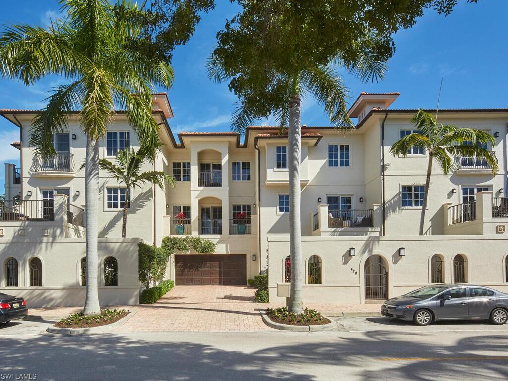 Located just steps from 5th Avenue South and a short stroll to the Gulf of Mexico, this elegant three-level villa epitomizes the essence of luxury living in downtown Naples. Offering over 3,200 square feet of thoughtfully designed space, this home combines the privacy of single-family living with the ease of a central, coveted location.
A private elevator seamlessly connects all three levels, each offering distinct features and refined touches. The ground floor serves as a versatile retreat with a full bath, wet bar, wine cellar, and sliding doors that lead to a lush outdoor oasis complete with a pool, spa, gardens, covered dining area, and outdoor kitchen. The second level is the heart of the home, featuring an expansive open floor plan with soaring ceilings, a cozy fireplace, a beautifully renovated Poggen Pohl kitchen, a full bath, and two covered patios that invite effortless indoor-outdoor living.
On the top level, the spacious primary suite offers a serene escape with a sitting area, private balcony, and a spa-like primary bath featuring a jetted tub and walk-in shower. A guest suite with its own private bath and balcony, along with a conveniently located laundry room, completes the upper floor. Additional highlights include a two-car garage with custom enhancements, 1,000 square feet of outdoor living space, and multiple terraces offering charming city views. With its prime location and exquisite design, this villa captures the pinnacle of luxury and convenience, just five blocks from the beach and moments from Naples' vibrant downtown scene. No water intrusion during any of the tropical storms.