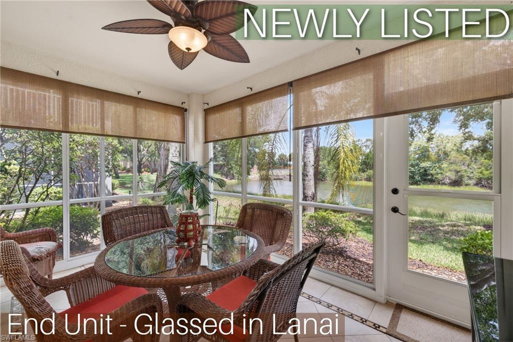 LAKEFRONT COTTAGE CONDO AT COLONIAL COUNTY CLUB!! Beautiful ground floor condo with lake view and unique glassed-in lanai giving it a spacious and "homey" feel! Features include open floor-plan, crown moulding, upgraded tile floors throughout with cozy carpets in the bedrooms and den, large kitchen with black stainless steel appliances, Corian countertops and all wood cabinets; spacious primary bedroom with upgraded en-suite bathroom featuring a walk-in-shower with frameless glass enclosure and dual sink vanity; large guest bedroom, upgraded guest bath with convenient tub/shower combo finished with an upgraded frameless glass enclosure, upgraded fans and light fixtures throughout, multiple tray ceilings, inside laundry closet with full size washer and dryer, CARPORT, plenty of extra parking and so much more!! Highlighting the home is a fully enclosed lanai with all glass sliding doors that can be opened to let in the fresh air!! This room is complete with tile floors and an access door to the backyard adding to the expanded living area, spacious feel and connection to the outside!! Furnishings in the home are also NEGOTIABLE giving you a convenient nearly turnkey option!! When you purchase this condo you are also purchasing the incredible Colonial Country Club lifestyle that comes with it! The Lakes Membership is included in your fees and grants access to all club amenities like dining, fitness, tennis, pickleball, bocce, and pay-as-you-play golf access when the course is available! Be sure to check out the community website. This fabulous condo is also ideally located near the area's best shopping, dining, entertainment, airport and just a short drive to white sand, turquoise water beaches of Fort Myers, Bonita and Sanibel!! Call for your private showing today!!