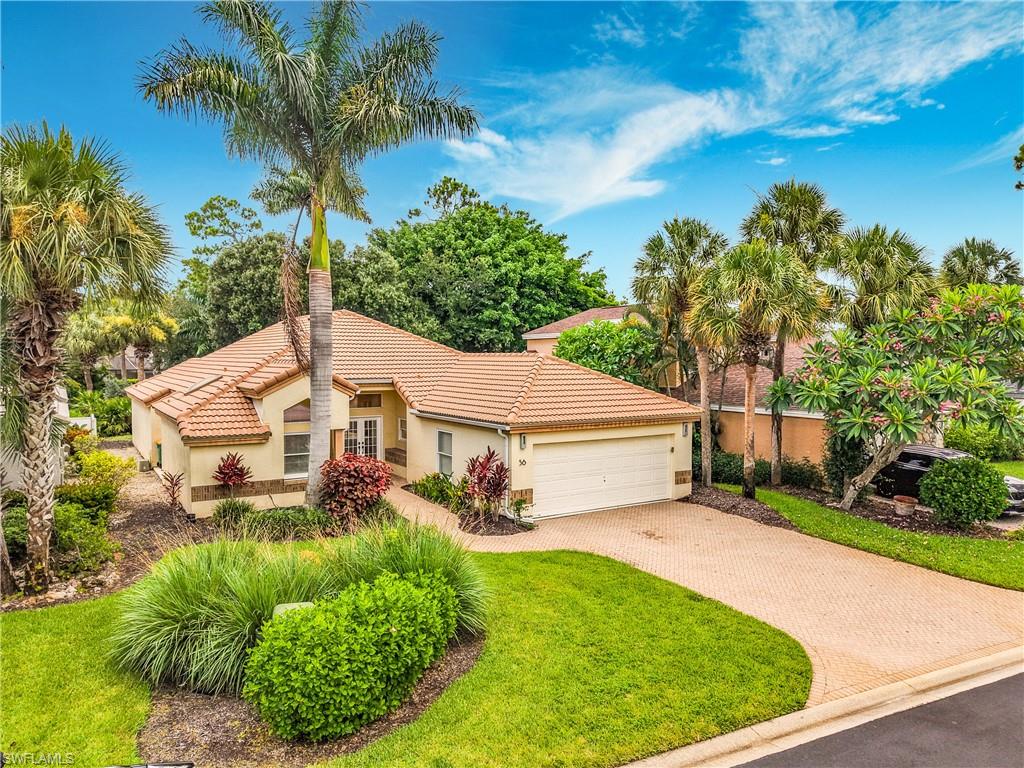 LOWEST PRICED SINGLE FAMILY HOME AT EAGLE CREEK GOLF AND COUNTRY CLUB! Unlock incredible equity with this rare, value-add opportunity in Eagle Creek, one of Naples’ most prestigious golf and country club communities. Boasting 1,841 square feet of light-filled, open-concept living space, this home serves as the perfect blank canvas to bring to the next level—especially with fully updated homes in the neighborhood selling for double or triple this price. Much of the heavy lifting has already been done, including a new tile roof installed in 2019, elegant Italian marble flooring, and a brand-new kitchen and bathroom outfitted with premium quartz countertops, stainless steel appliances, and modern soft-close cabinetry. Perfect for entertaining or relaxing, the floor plan features a formal dining room, a built-in wine bar, a convenient laundry room with a built-in ironing board and a convenient washing tub, and a spacious primary suite complete with both a soaking tub and a walk-in shower. Outside, the oversized, screened-in lanai hosts a fully operational jacuzzi, creating the ultimate private Florida oasis overlooking the preserve with mature landscaping. Attached two-car garage for storage and convenience. Priced for an immediate sale and offering unmatched upside potential, this property is ready for a quick closing—schedule your tour today! Enjoy world class golf and amenities in one the most prestigious golf and country clubs in Naples! Also located within minutes to downtown, shopping, the beaches and perfect location to go towards North Naples or South to Marco Island!