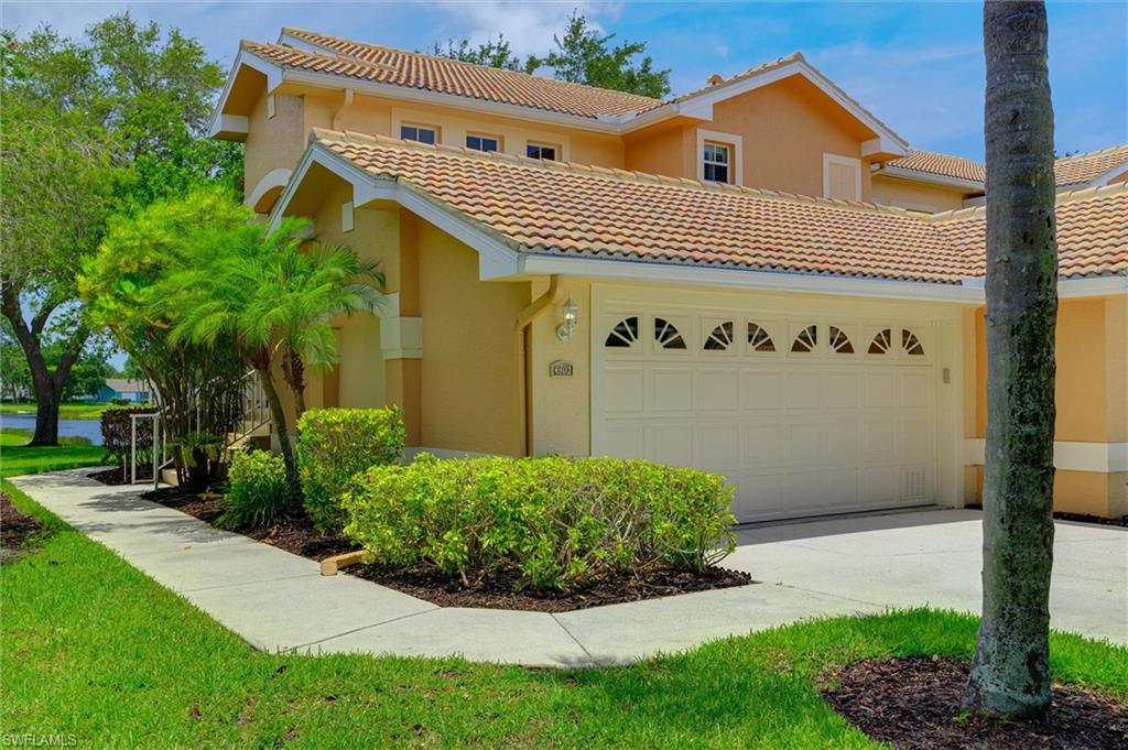 First Time on the Market! After years of enjoying one of the longest and most breathtaking lake views in Parker Lakes, the original owner is ready to pass this exceptional home on to its next chapter.

Perfectly positioned on a quiet cul-de-sac with desirable southern exposure, this charming Seabreeze II coach home offers a peaceful, park-like setting and an abundance of natural light. An oversized driveway provides parking for four or more vehicles in addition to the attached two-car garage.

A private side entry with split stairs leads either to the garage or the spacious second-floor living area, where vaulted ceilings create an open and inviting atmosphere. Designed with flexibility in mind, the home features three bedroom spaces with closets, though the current owners selected the popular flex-room configuration, complete with French pocket doors and an open connection to the stairway.

The thoughtfully customized kitchen is a dream for home chefs and bakers alike. A former passageway was enclosed to create an expansive pantry with abundant storage for small appliances, cookware, and kitchen essentials. Stone countertops, ample workspace, and a movable island that serves as both a prep station and casual dining area complete the space.

Enjoy the stunning lake view year-round from the enclosed lanai, featuring acrylic windows that transform the space into a comfortable all-season retreat. The owner's suite offers a walk-in closet, linen storage, and an upgraded shower, while the guest bedroom can be closed off to function as a private suite and includes its own generous walk-in closet.

Additional features include a convenient laundry room with extra storage, a new water heater, and an air conditioning system that is only 2½ years old. Community roofs were replaced in 2023, providing added peace of mind.

Recent community bylaw updates now allow engineered wood and luxury vinyl plank flooring in second-floor units, offering an easy opportunity to personalize and modernize the interior. Existing carpeting throughout the living areas is approximately three years old.

Best of all, this property is located in an X flood zone, with no CDD fees and no history of flooding. Parker Lakes has extensive amenities and is minutes from Sanibel and Fort Myers Beach.  Offered turnkey furnished, this move-in-ready residence allows you to start enjoying the Florida lifestyle from day one