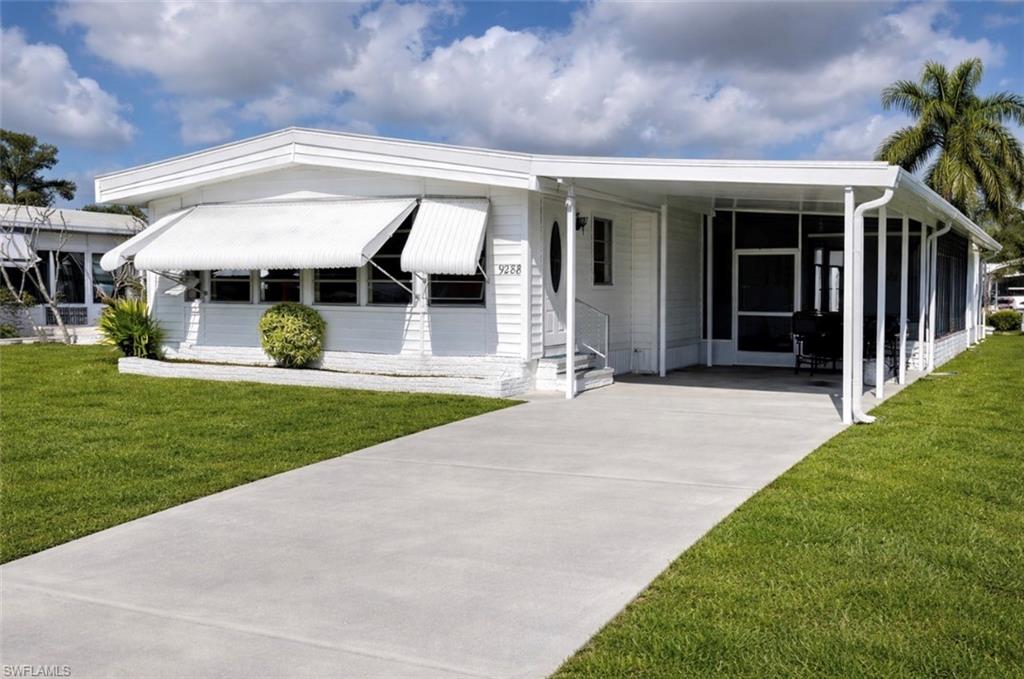 This 2 bedroom, 2 bath home located in Imperial Harbor, a 55+ community, offers a functional layout with multiple living spaces, including a living room, separate family room, and dedicated dining area. The kitchen provides ample cabinetry and counter space and features a convenient pass-through window to the family room. The dining room includes a built-in cabinet for additional storage and display. The master bedroom has a private door leading to the side of the home. A door from the dining room opens directly to the screened lanai, which features new screening and includes a utility room for added convenience. The carport provides covered parking with direct access into the family room. The roof was replaced in 2017 and includes additional strapping. With flexible living areas and practical access points, this property offers an opportunity to personalize within this established community. Club membership is available for $1,500 ($350/year to maintain), providing access to amenities such as a heated pool, library, fitness center, billiards, bocce, shuffleboard, pickleball and more.