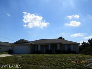 Location, Location, Location!!!!  This 3 bedroom, 2 bathroom home boast a large open floor plan with den.  Home offers impact resistant windows(except back patio sliders), indoor laundry and a huge screened patio. Home is in a perfect located just off Sunshine and Lee Blvd.   Home is close to shopping, dining and entertainment.   Home shows signs of defective drywall and is priced accordingly.  Call for your private showing today.