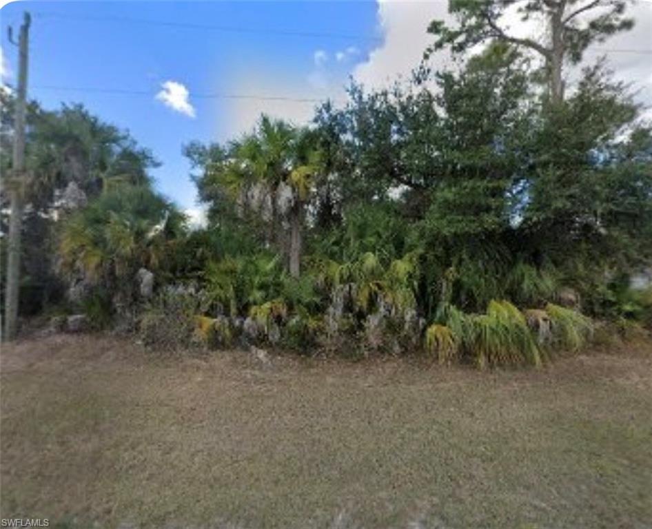 Nearly 11,000 sq ft lot on quiet paved street with utilities available.  New homes currently being built.