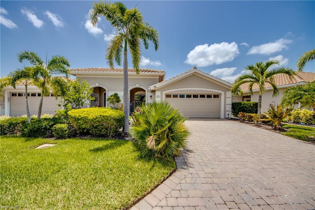Welcome home to this beautifully maintained 2-bedroom plus den villa located in the sought-after maintenance-free community of Venetian Pointe, just 5 miles from the beach! This spacious residence offers nearly 1,700 square feet of living space, a 2-car garage, and a charming private courtyard entry that creates a warm and inviting first impression.

Inside, you’ll find soaring ceilings, an abundance of upgrades, and thoughtful features throughout. Enjoy peace of mind with impact windows, electronic storm shutters, and a whole-house generator. The kitchen features a gas range, granite countertops, real wood soft-close cabinetry, and convenient pull-out drawers. Additional updates include plumbing improvements, a gas water heater and dryer, and beautifully renovated bathrooms with walk-in showers showcasing stunning tile details.

The spacious primary suite overlooks the tranquil lake view, offering a relaxing retreat while still allowing you to enjoy the professionally maintained landscaping surrounding the home.

Venetian Pointe is a gated, pet-friendly, non-age-restricted community offering resort-style amenities including a heated pool, clubhouse, and fitness room. Conveniently located near Fort Myers Beach, shopping, dining, Southwest Florida International Airport, and several colleges, this home offers the perfect blend of comfort, convenience, and Florida lifestyle living.