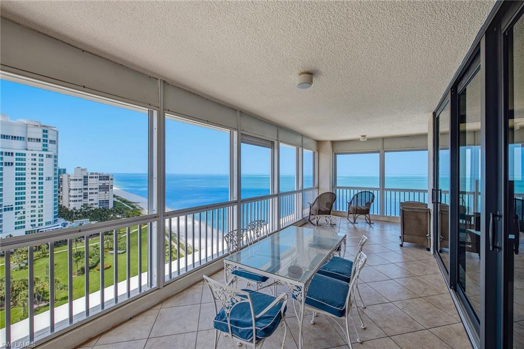 Experience breathtaking panoramic southwestern views of the Gulf, Venetian Bay and the sparkling Naples skyline from this 18th-floor residence in Park Plaza, in the prestigious Park Shore neighborhood. Offering over 3,500 square feet of living space, this floor plan features two private en-suite bedrooms, a den and an additional full bath. Wall-to-wall windows and sliders showcase stunning views from nearly every room while flooding the home with natural light. This residence offers a sweeping screened balcony, a generous amount of storage space throughout, a full-size laundry room with a wash tub and much more. The kitchen features an island, an electric cooktop, two walk-in pantries and a wet bar. The spacious main bedroom includes three walk-in closets and a spa-inspired bath with a separate shower and a jetted soaking tub. Additional highlights include impact windows and sliders, electric hurricane shutters, two assigned first-floor parking spaces, a secured lobby and on-site management and staff. Residents enjoy an exceptional collection of amenities, including a newly redesigned resort-style pool deck with a pool, spa, grills, pavilion and social room, as well as a rooftop club room and terrace, theater, billiards room, fitness center, saunas, pickleball and tennis courts, guest suites, extra storage and the Park Shore Promenade, a scenic 1.3-mile paved path along the beach. Owners may lease their residence twice per year with a 90-day minimum. Boating enthusiasts can purchase or lease a slip at the Venetian Bay Yacht Club, while world-class waterfront shopping and dining at Venetian Village are just moments away.