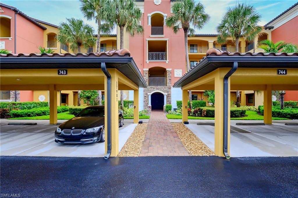 Experience elevated resort-style living from this rarely available top-floor residence showcasing sweeping golf course and lake vistas with spectacular western exposure. Perfectly positioned to capture unforgettable sunset skies, this beautifully appointed condominium offers a seamless blend of comfort, style, and effortless Florida elegance—complete with a coveted golf membership included. This light-filled 2-bedroom, 2-bath home spans approximately 1,122 square feet and is offered fully furnished for immediate enjoyment or investment opportunity. Thoughtfully updated with modern finishes, the interior features diagonal-set ceramic tile throughout the main living areas, plush carpeting in the bedrooms, and refined details such as crown molding and granite countertops. The well-designed kitchen is equipped with stainless steel appliances and offers multiple dining options including a breakfast bar, cozy breakfast nook, and a dedicated dining area ideal for entertaining. The spacious primary suite provides a tranquil retreat with an easy step-in shower and elegant finishes, while the guest bedroom offers comfort and privacy for visitors. Step outside to the private screened lanai and unwind as you take in panoramic views of the 1st and 18th holes, shimmering water features, and glowing sunset horizons—your own personal backdrop for evening relaxation. Ideally located near the satellite pool, residents enjoy convenient access to sun-soaked leisure just moments from home. With immediate occupancy available and strong rental potential, this property is as versatile as it is desirable. Bonita National sets the standard for luxury amenity living in Southwest Florida, featuring a resort-style pool with lap lanes and poolside bar & grill, a championship golf course with expansive practice facilities, a grand two-story clubhouse, eight lighted Har-Tru tennis courts, a full-service spa, and a state-of-the-art fitness center. All just a short drive to pristine Gulf beaches, Southwest Florida International Airport, premier shopping and dining at Coconut Point and Miromar Outlets, and everything the vibrant Bonita Springs lifestyle has to offer.