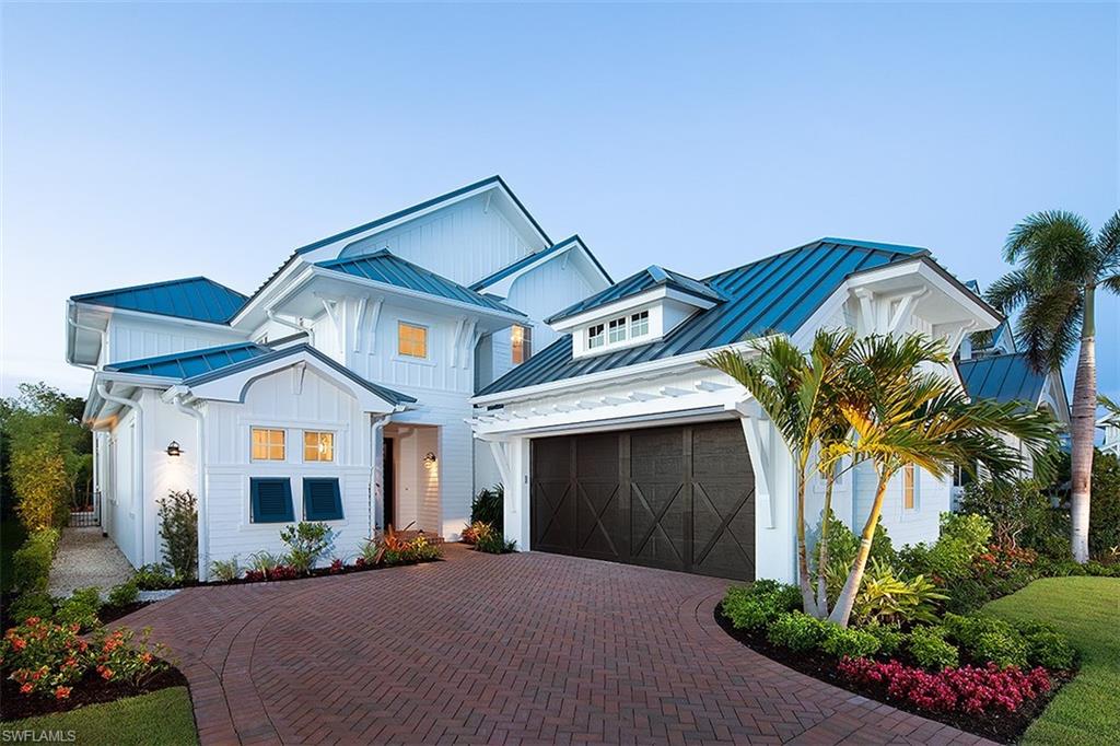 Lot 31:Combining mixed media of soft & shine, this casual & sophisticated coastal retreat furnished by Clive Daniel offers a great room design & impressive 2nd floor viewing deck with canal views. This 2-story “Useppa plan” is situated on a lushly landscaped lot & features a custom designed pool & spa area with water feature, shell stone deck, covered lanai with electronic screen protection, outdoor fireplace & grilling station. Ground floor master suite configuration & 2nd level guest area with well-appointed flex space, Ruffino cabinetry, wood flooring, custom trim work, Silestone countertops and Wolf/Subzero appliance package (with natural gas range). Private boat slip and optional Membership to the Naples Grande Golf Club included with purchase. Mangrove Bay is perfectly situated in Old Naples, along the Gordon River & adjacent to Baker Park, the Naples Dog Park, 5th Avenue Shopping & Dining District. Enjoy low maintenance living, access to a luxury Wellness Center (complete with state of the art fitness room, resident lounge, ground level kayak/paddle board storage, private boat ramp and Concierge Services). Designed by MHK architecture and built by Lotus Construction