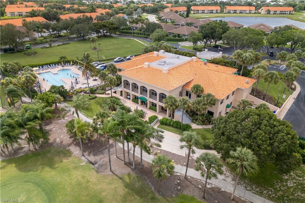 Bonita Fairways Offers an Exquisite Charm with Fantastic Values!! This rare combination of both a gated-community and golf resort style amenities.  Conveniently located on the first floor, this charming 2 bed/2 bath condominium checks all the boxes.  You'll find the space you need whether you decide to make this your permanent home or a vacation getaway! Kitchen is open to living.  Plenty of seating with breakfast bar and 2 dining areas.  Living area is open and spacious.  Abundance of closets, plenty of cabinets, and large pantry. Detached 1 Stall Garage. 2025 New AC / 2.5 Ton Split System!  Enjoy your choice of 2 swimming pools (one dedicated to specific buildings, the other at the clubhouse). Now lets talk Golf! The Bonita Fairways Golf Club is an 18-Hole Gordon Lewis-designed executive course. Residents can enjoy golf but are not required to purchase a membership.  If you are active there are unlimited activities such as a fitness center, pickleball & tennis courts, bocce and shuffleboard, clubhouse, library, cardrooms, billiards, meeting & banquet facilities.  Plenty of social activities throughout the year.  Centrally located you are within minutes beaches such as Bonita Beach and Barefoot Beach.  Close proximity to shopping & fine dining at The Promenade or Coconut Point.