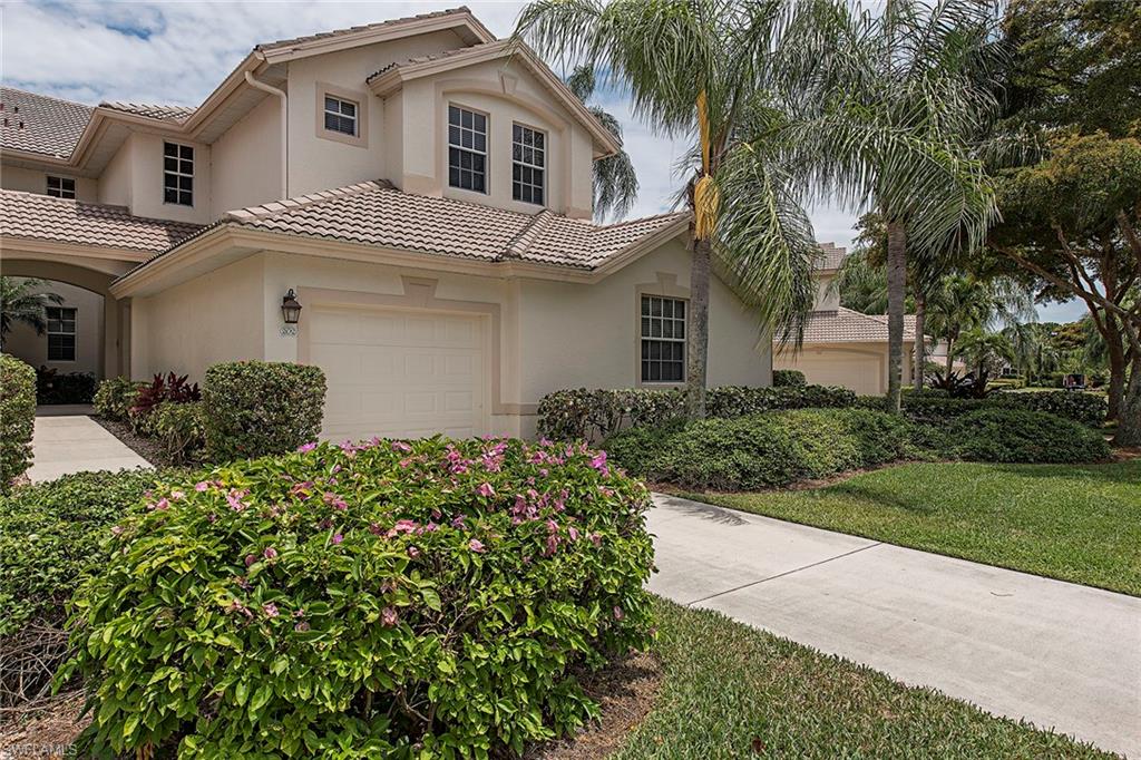 Enjoy the best lake views in Bay Pointe from this impeccably maintained, second-floor condominium with three bedrooms, two bathrooms and one-car garage. The home features new stainless steel appliances, new washer and dryer and new quartz countertops. All just replaced in May 2016. Tile on diagonal in all living areas, tile backsplash, tray ceiling in dining room, decorative lighting in both bathrooms and hurricane shutters on the lanai. Just around the corner from the community pool and across the street from the beach shuttle bench. Neutral colors throughout make this home easy to personalize. Come enjoy life in this world-class community with five golf courses, shuttles to and from the beach, a full marina and restaurant, parks with bocce and pickleball courts, 18 tennis courts, a new world-class fitness center and trails for nature lovers.