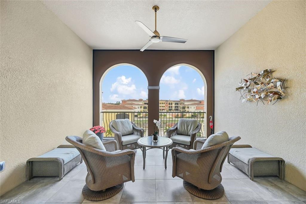 WATER VIEWS, GREAT LOCATION AND IMMACULATE CONDO! This home is an exceptional opportunity for the discerning buyer. Beautifully maintained and ideally positioned with one of the community's most desirable water and courtyard views, this 3-bedroom, 2-bath residence offers 1,748 square feet of thoughtfully designed living space and an oversized two-car garage in Genova at Estero. Elegant and stunning with wood and porcelain tile floors throughout the condo along with 10-foot ceilings, 8-foot solid-core doors, and hurricane-impact windows and doors. The interior reflects a clean, contemporary aesthetic with carefully selected finishes, including KraftMaid cabinetry, quartz countertops, Kohler fixtures, pull-out pantry drawers, rich wood flooring, crown molding, detailed window casings, and porcelain tile throughout the bathrooms, lanai, and balcony. Double French doors open to a flexible study that easily serves as a home office or third bedroom. The spacious primary suite includes a well-appointed bath with an expansive walk-in shower featuring dual showers enclosed by frameless glass. Residents enjoy access to an exceptional collection of amenities, including an indoor lap pool, outdoor resort-style pool, fitness center, aerobics studio, sauna, clubhouse, and bocce courts. A private gated entrance provides direct access to Estero Community Park with pickleball courts, a dog park, walking paths, and a community center. Ideally located just one mile from Coconut Point, approximately 10 minutes from Southwest Florida International Airport, and eight miles from the Gulf beaches, this residence offers a rare combination of quality construction, refined finishes, exceptional views, and everyday convenience. This is a must-see!