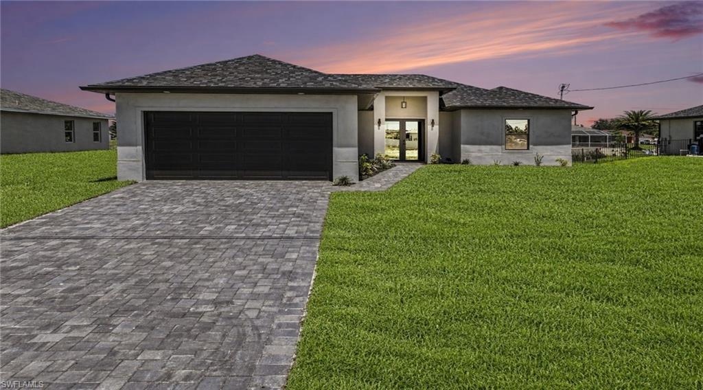 Imagine living in a stunning new home, ready for you by the end of the year! This beautifully designed 3-bedroom plus den residence offers everything you need for comfortable, modern living. With 2 full bathrooms and a spacious 2-car garage, it’s perfect for families or anyone who loves extra space.  Nestled on a peaceful freshwater canal with breathtaking western exposure, enjoy glorious sunsets right from your backyard. The open-concept layout enhances the flow of natural light and air, making the home feel bright and inviting. Tile flooring runs throughout the entire house, combining style with easy maintenance.  The heart of the home is the kitchen—a chef’s dream with a large quartz  island that’s perfect for meal prep or casual dining. Impact-resistant doors and windows provide added security and peace of mind, while allowing you to take in serene canal views. Located in an X Flood Zone so flood insurance is not required.  This vibrant community offers more than just a beautiful home. You’ll have quick access to shopping, dining, and an array of recreational activities, ensuring there’s always something fun to do nearby. Whether you’re unwinding at home or exploring the neighborhood, this location truly has it all.  Make this exceptional home yours before the end of the year and start living the lifestyle you’ve always dreamed of—comfort, convenience, and beauty all in one place!