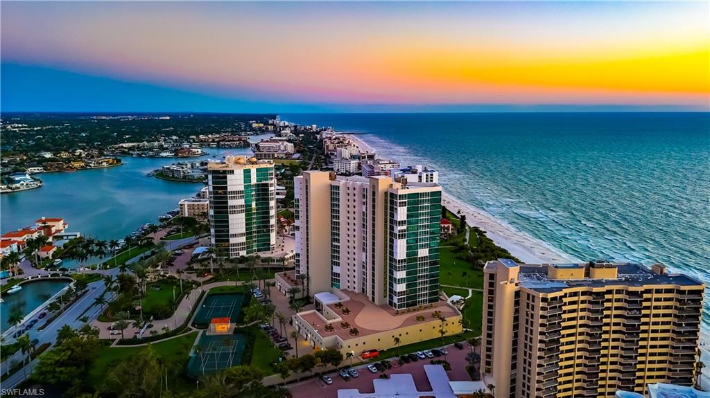 Indulge in the epitome of luxury living within the prestigious confines of this 12th-floor oasis at Le Ciel Park Tower, a jewel nestled in Park Shore's skyline. Located in the highly sought-after and rarely available 01 stack with southern exposure and an ideal vantage point, immerse yourself in uninterrupted, awe-inspiring vistas that stretch from the tranquil Gulf waters to the captivating Bay and the twinkling city lights. Spanning 3,037 square feet of living space, this two-bedroom with a den, and three full bath residence is a testament to refined taste and meticulous attention to detail. The den can effortlessly be transformed into a genuine third bedroom. Bathed in an abundance of natural light, the interior is adorned with tasteful finishes, creating an ambiance of understated elegance and sophistication. The heart of this residence lies in its great room, a spacious and functional haven, perfect for gathering with family and friends against the backdrop of amazing views. Retreat to the sanctuary of the primary suite, where tranquility reigns supreme. His and hers walk-in closets offer ample storage, while the en-suite bathroom boasts dual sinks, a separate tub, and a shower, providing the ultimate in comfort and convenience. Two deeded parking spaces under the building are included with the residence, adding to the convenience. Additional features such as electric hurricane shutters and extra storage further enhance the ease and comfort of living. Step into Le Ciel Park Tower and experience a world of opulence and sophistication, where every detail is meticulously curated to exceed expectations. Residents of Le Ciel Park Tower enjoy access to a wealth of world-class amenities, including a stunning lobby, social room, private beach access, fitness center, tennis courts, and an on-site manager, all within the confines of a gated entrance for added security and privacy. For those with a passion for maritime pursuits, the option to purchase or lease a boat slip at the Venetian Yacht Club provides the ultimate opportunity to explore the azure waters of the Gulf at leisure. Conveniently located just steps away from Venetian Village, residents have access to upscale dining, shopping, and entertainment, ensuring that every desire and indulgence is easily satisfied within reach. Embark on a journey of refined living and timeless elegance at Le Ciel Park Tower, where every moment is a celebration of luxury and sophistication.