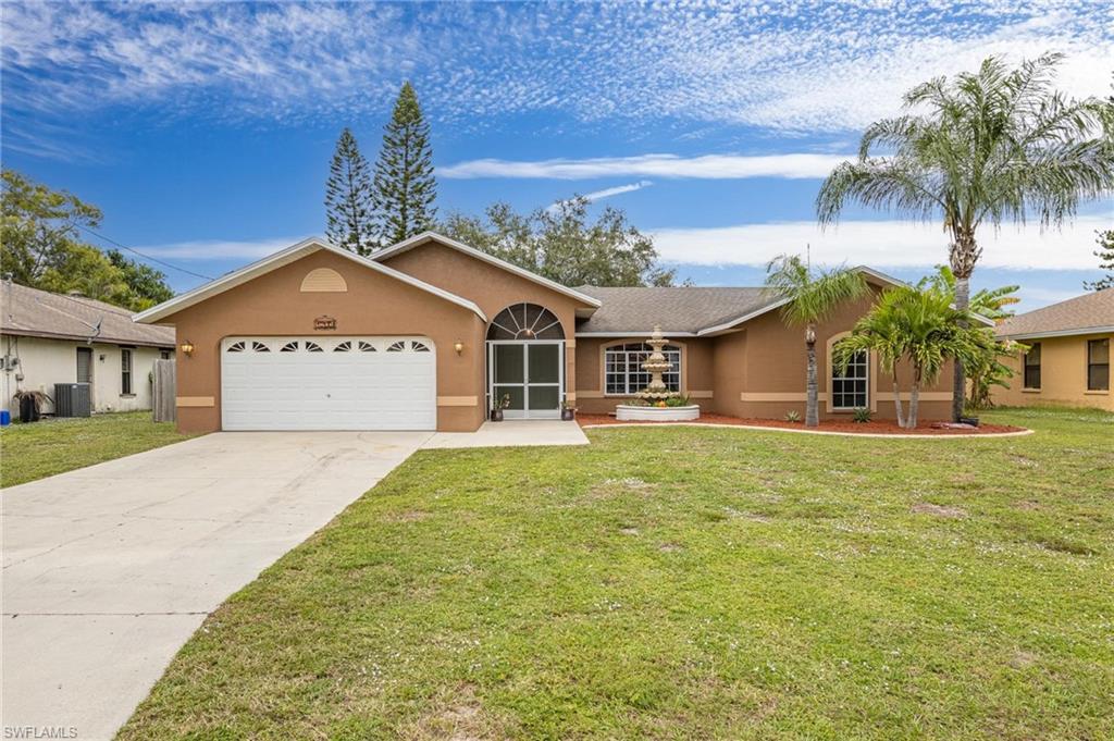 Tucked away in a quiet neighborhood this home is conveniently located to all the shopping and restaurants that Del Prado Boulevard has to offer. This spacious split plan is complete with 4 bedrooms and 2 full bathrooms that total over 1800 square feet! Tile throughout, indoor laundry room, updated owner’s suite bathroom and all assessments paid! French doors that open to an under truss lanai and fully fenced in yard with plenty of room for a pool!