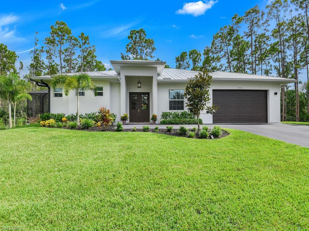 GORGEOUS home in Bonita Springs on 1.44 acres! This beautiful custom built 4 bedroom home shows like a model! Offering over 2,100sf of comfortable living space with all the bells and whistles. Great room design with an open concept gourmet kitchen, and a split bedroom floor plan with all the upgrades, stunning quartz countertops, stainless steel appliances, including a wall oven & cooktop and stainless vent, 42" white shaker cabinets, impact doors & windows, 10' tray ceilings, crown molding, custom shelving in all closets, high-end plank tile flooring, and metal roof. Spacious master suite features a HUGE master bath with dual entry shower and multiple shower heads, polished marble, soaking tub, and dual sink vanities. This property is an absolute GEM. Beautiful sparkling brand new pool with brick pavers and pool cage! Outside auto security lighting that lights up the entire yard. It even has a brand new whole house generator! The lot is 100% upland, and zoned AG2 allowing external buildings, RV parking, workshops, oversized garages and anything else your heart desires. Transferrable 10 yr RWC Home Warranty for structural coverage. Private setting and yet so close to everything!