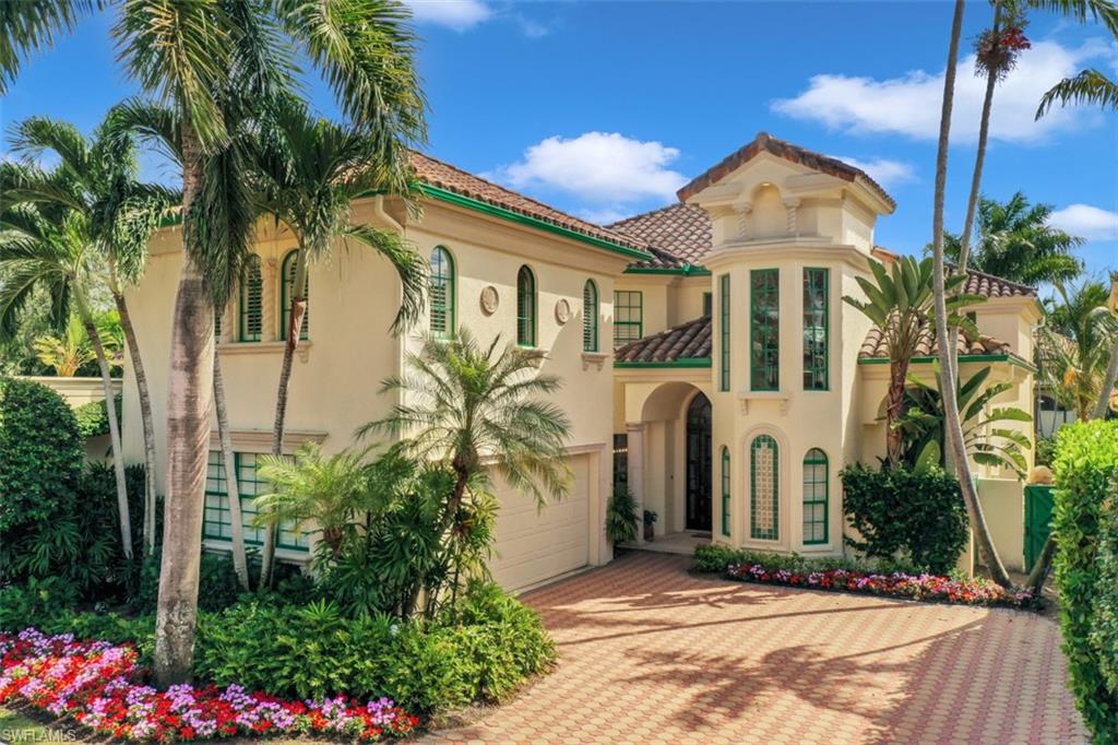 V.79 - Beautiful! Beyond the stately secured Gatehouse that leads to the exclusive Beach enclave of Bay Colony is the enchanting Villa neighborhood of Vizcaya. This two-story fabulously updated home is sited on a cul-de-sac street showcasing a charming inviting Gazebo. Defining today's indoor-outdoor living is an expansive covered lanai complemented by a picture-window caged pool, spa & deck on a tranquil lakefront setting. A cleverly designed center island punctuates the gorgeous open living space for easy entertaining and seamless flow. Access the outdoors from your relaxing ground-floor Owner’s Suite while your guests select from four spacious upstairs bedrooms where they can also sunbathe on a private balcony. Enjoy a luxury lifestyle with private beach access and attended service, a tennis center and a fabulously remodeled member-only Beach Club and restaurant all set within SWFL's most desired beachfront community, Pelican Bay. Bordered by the Waterside Shops & Artis-Naples to the south and the Ritz Carlton to the north, it has two additional private beach restaurants, over two miles of coastline and epitomizes elegant casual living.