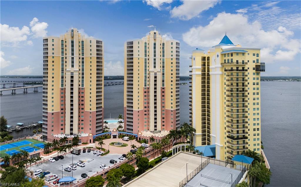 Welcome to Unit #704 at the Riviera, one of Downtown Fort Myers' premier riverfront condominium communities. This beautifully maintained residence offers breathtaking views of the Caloosahatchee River and an exceptional lifestyle just steps from the Historic River District's vibrant dining, shopping, entertainment, and year-round events.
Inside, you'll find an open-concept floor plan with abundant natural light, spacious living and dining areas, and a private balcony perfect for enjoying spectacular sunsets and watching boats glide along the river. The well-appointed kitchen features ample cabinetry, solid surface countertops, and a breakfast bar that opens to the main living space, a whole-house water filtration system, making it ideal for both everyday living and entertaining.
The generously sized primary suite offers balcony access, a walk-in closet, and an en-suite bath designed for comfort and convenience with an extra large storage closet. 2 spacious guest bedrooms and full guest bath provide privacy for family and visitors.
The Riviera offers an impressive collection of resort-style amenities, including an infinity-edge heated pool overlooking the river, spa, fitness center, tennis and pickleball courts, theater room, library, community room, business center, kayak launch, BBQ area, gated entry, covered parking, and professional on-site management.
Whether you're looking for a full-time residence, seasonal retreat, or investment opportunity, this riverfront condominium delivers luxury, convenience, and the best of downtown Fort Myers living.
Schedule your private showing today and experience the Southwest Florida lifestyle at its finest!