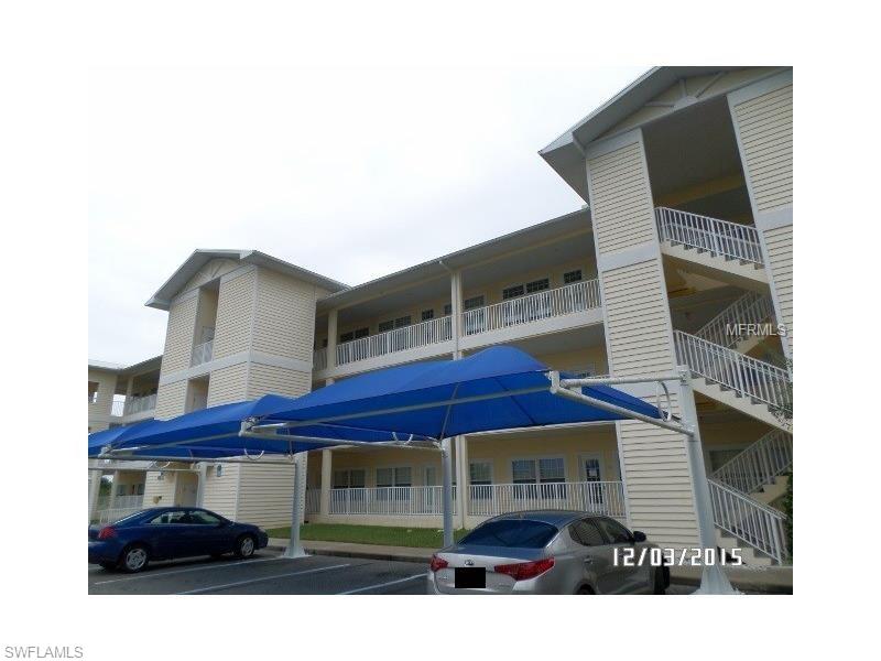 Sought after top floor End Unit in The Condominiums at Waterside - a private gated community.    Enjoy open views of the lake and pool area from your large screened lanai.    Open floor plan with volume ceilings, lots of windows offering natural light,  3 bedrooms and 2 baths, granite counters in kitchen and baths.   Breakfast bar and pantry in kitchen.   Great location close to world class beaches, marinas, golf, and restaurants.