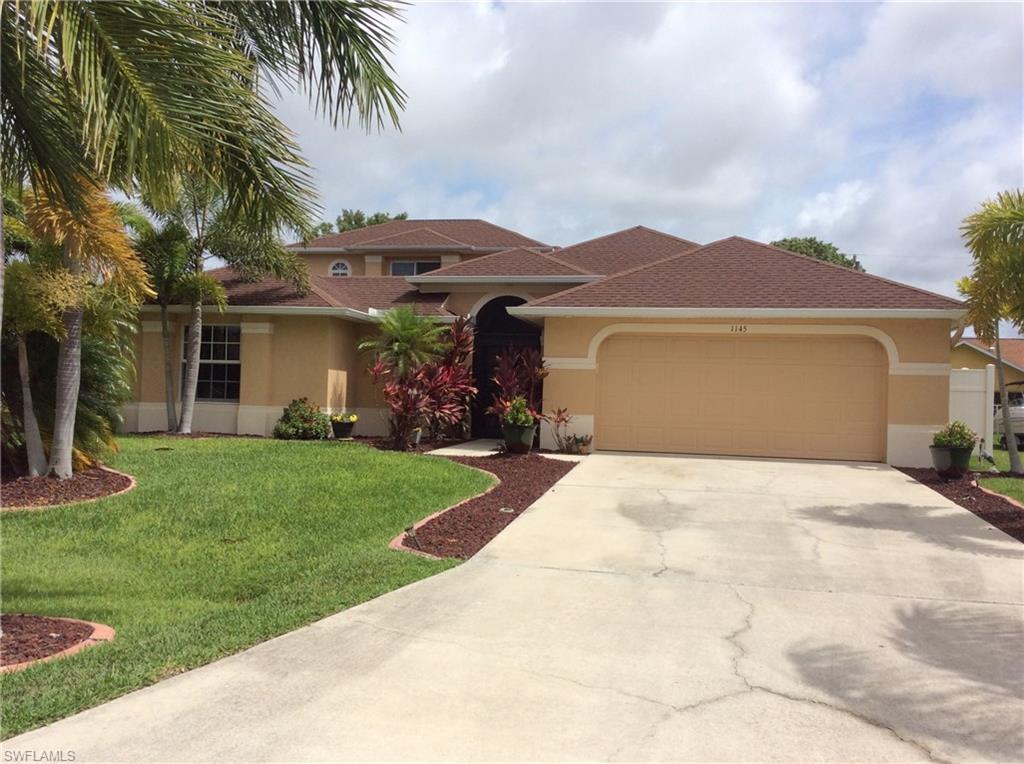 PRICE REDUCTION! Two Story Courtyard Salt Water Pool Home located in the popular SW Cape Coral. Assessments Paid! Sliders open up from all first level rooms and surround the courtyard pool area. Second floor master suite has spacious walk in closet, private balcony, large walk in shower with dual heads, and sitting bench. Guest Cabana suite can be used as another master, or is great to be used for guest with total privacy including their own bathroom. The kitchen comes with 42" cabinets, extended office space, eat in bar area, that opens up to the a formal dining area. There is also a great room, that could be used as a media room, with tray ceilings with plenty of light and sliders that open up to the courtyard and to the salt water pool. Tile flooring through out the living area and laminate in master bedroom and Guest House. Brand new AC, 16 seer 4 ton system, just installed along with new pool pump.  Large fenced in back yard, wonderful area for children to play, pets and entertaining. If you are ready to make your move to Florida and are looking for a home that is  set up perfect for entertaining, or even for a family, you will not want to miss seeing this home.