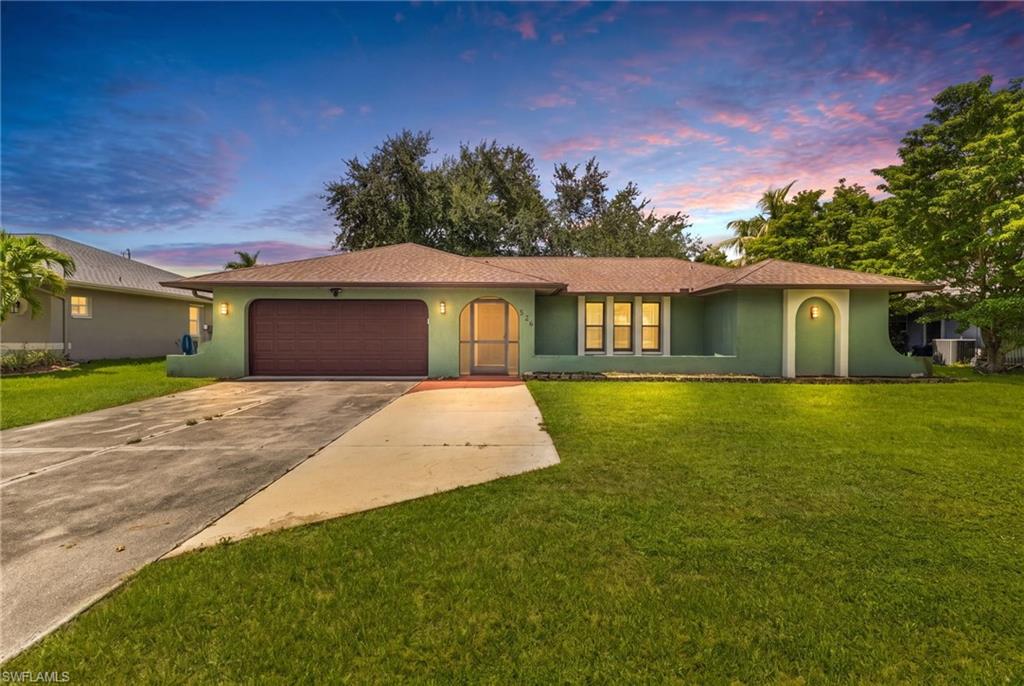 Move-in ready! Beautifully updated 3-bedroom, 2-bath home in one of Cape Coral’s desirable, well-maintained neighborhoods. This light-filled residence features an open and functional floor plan, remodeled bathrooms, laminate, tile, and luxury vinyl plank (LVP) flooring, stainless steel appliances, and an attached 2-car garage.
Enjoy years of worry-free ownership with impact-resistant windows and doors, a new roof and rain gutters (2020), and a 2023 A/C system. Mature shade trees create a relaxing backyard setting, perfect for outdoor living and entertaining.
Connected to city water and sewer, this home is located in a community with no special assessments and offers convenient access to shopping, restaurants, schools, parks, golf courses, boating, and all that Cape Coral has to offer. Motivated seller willing to assist with the buyer's closing costs.
