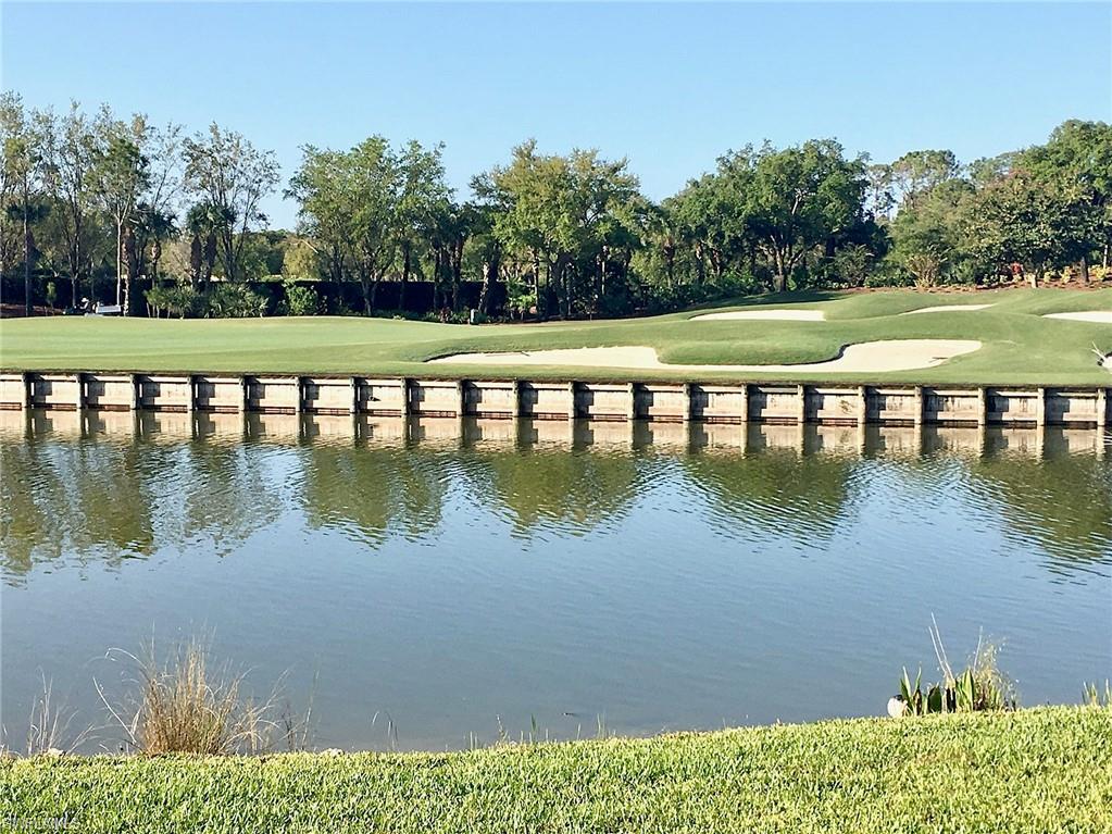 Vasari Country Club is the #1 bundled golf community in the North Naples / Bonita Springs area. With an 18 hole golf course challenging for all levels of play. There is an active tennis league; 3 bocce ball courts, fitness center; resort style pool; and four pickle ball courts are currently under construction. There are two dining options in the clubhouse for members and guest. The award winning pro-shop has all of your golfing and tennis needs. Vasari is just a short drive to the area beaches, RSW Airport, Mercato; Coconut Point and other shops and services. This second floor condominium features a gourmet kitchen perfect for the home chef or the "take out specialist" with granite countertops, tile backsplash, 36" toffee colored cabinets, food pantry, newer stainless steel kitchen appliances including a Whirlpool French Door refrigerator, range, microwave, dishwasher and disposal. This well designed home features two bedrooms, two baths, a den with a sleeper and curtains to provide privacy for family and guests, a sunlit breakfast room, kitchen counter with bar stools for quick bites and a large great room to enjoy the view. The owner's suite is large with two walk in closets, a double vanity and a large shower. The large screened lanai is perfect for a morning cup of coffee or tea ; an afternoon beverage or dining al fresco or an evening of conversation and food with friends. The Trieste buildings have brand new roofs. This home is also a short walk to the Trieste pool where members gather daily and also at regular pool get togethers, Your car will be protected from the elements with a covered carport. This beautiful home is being sold "turnkey" so the only thing you'll need to bring is your toothbrush, golf clubs, and a few extra golf balls for the occasional miss hit.