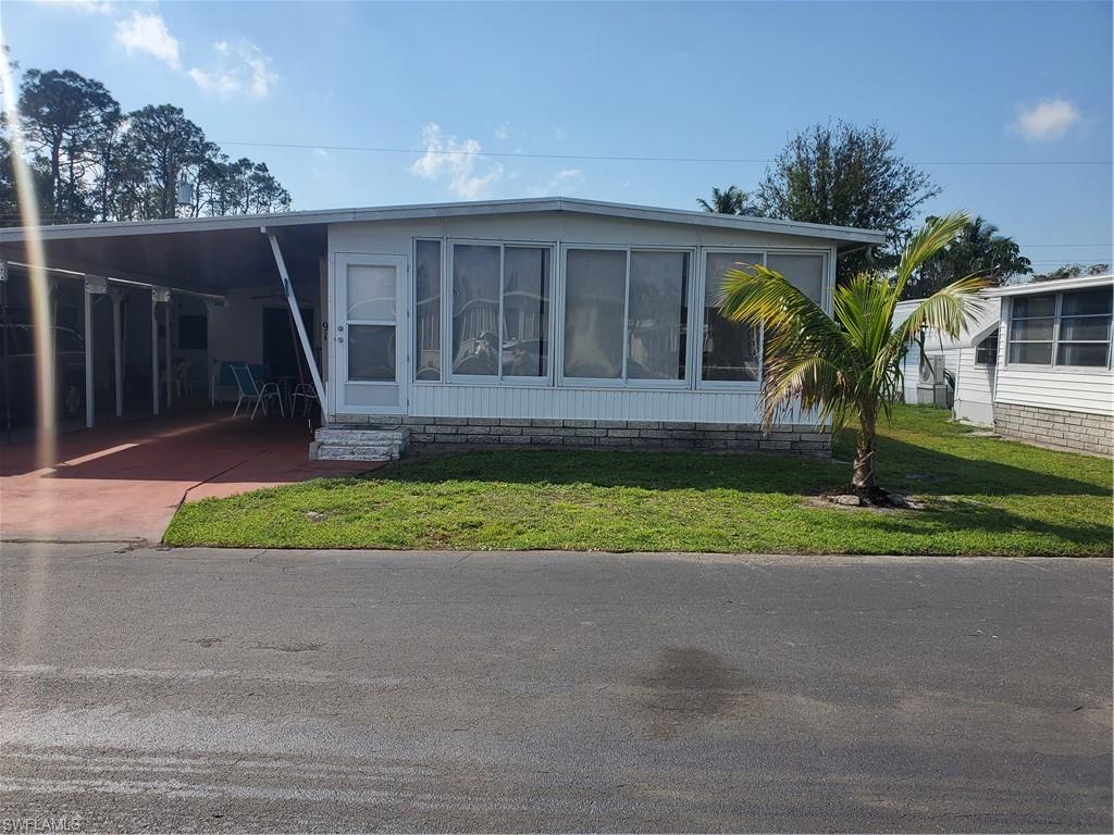 Enchanting Acres Mobile Home Park is a 55 plus in age community. The mobile is a double wide with 2 bedrooms, 2 bathrooms with front Florida room and ex-large shed. Being sold turnkey furnished. Ac is a mini spilt, each room has its own temperature control. 
Enchanting Acres is a coop community. Amenities include pool, shuffle board courts, club house, and billiards.  Conveniently located to Downtown Naples, beaches, Bayshore Arts District, Sugden Park, East Naples Community center that has Pickle ball Courts. New Public across the street from park.