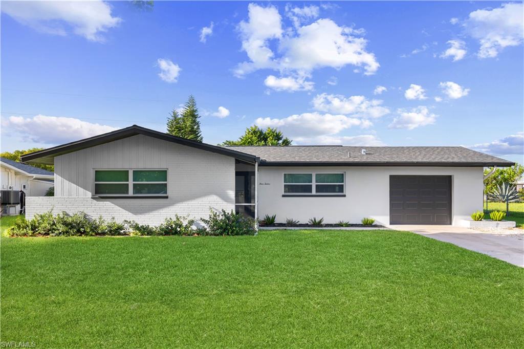 Presenting an exceptional residential opportunity at 412 El Dorado Parkway East. Situated in the highly desirable Southeast quadrant of Cape Coral, this comprehensively remodeled, open-concept residence provides an abundance of versatile living space. The property encompasses 3 bedrooms and 2 bathrooms across 1,658 square feet of refined interior. Located within a prestigious neighborhood that maintains the impeccable standards of an association-managed community without the associated fees or restrictions, this property is offered with all assessments paid in full.

The residence is thoughtfully designed to maximize natural light, establishing a bright and inviting interior environment. The well-appointed kitchen features 42-inch cabinetry, continuous quartz countertops, and a full suite of stainless steel appliances. Ideal for hosting, the kitchen includes a substantial breakfast bar accommodating seating for five. Above the sink, a large window frames the tropical landscape, offering abundant natural light, canal views, and views of local dog walkers and joggers during daily routines. Premium interior finishes include Luxury Vinyl Plank floors, high-efficiency impact windows, and extensive recessed lighting. A washer and dryer are also included with the property.

Significant capital improvements provide long-term reliability and operational efficiency. The home is equipped with a newly installed HVAC system and a new hot water heater, both updated in 2024. Furthermore, the property benefits from entirely new plumbing systems and is fully prepped for modern connectivity with fiber optic internet access.

The exterior grounds feature an expansive lanai and a fully fenced perimeter. The south-facing lot offers ample dimensions to accommodate the addition of a custom pool. Situated on a non-through section of El Dorado Parkway East, the property benefits from a tranquil, low-traffic streetscape enhanced by mature tropical landscaping. The location supports a highly walkable and golf-cart-friendly lifestyle, offering convenient access to the shopping, dining, and entertainment venues of downtown Cape Coral. Residents are moments away from the city's sole beach and the Yacht Club, which provides public amenities including a boat ramp, docks, a fishing pier, tennis facilities, a swimming pool, and year-round community festivals.

This property represents a compelling investment with substantial future upside. The adjacent Cape Coral Yacht Club is currently undergoing a comprehensive $225 million redevelopment project, slated to introduce a new community center, a resort-style pool, a waterfront dining establishment, and an upgraded marina. Additionally, the home is located mere minutes from notable new developments, including The Cove at 47th, Bimini Square, and Slipaway Marina, positioning it strategically at the center of Cape Coral’s ongoing civic transformation.