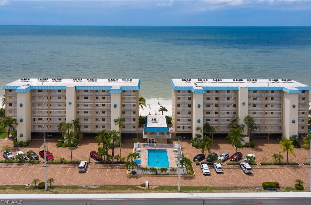 SPECTACULAR $1,000,000+ DIRECT ON GULF, BEACH AND SUNSET VIEWS! HOW ABOUT SUPER VACATION RENTAL INCOME OPPORTUNITIES WITH WEEKLY RENTALS ALLOWED. UNIT HAS OVER $50,000+/- IN RECENT RENOVATIONS. THIS "TURNKEY" 2 BEDROOM, 2 BATH 5TH FLOOR UNIT HAS ALL NEW CERAMIC MARBLE LOOK TILE FLOORS THROUGHOUT THE WHOLE UNIT. KITCHEN HAS ALL WOOD CABINETS, STEEL "STEALTH" BLACK APPLIANCES, AND LEVEL 5 GRANITE TOPS. CONDO HAS ALL ELECTRIC "EASY TOUCH" STEEL ROLL-DOWN SHUTTERS ON LANAI FOR TOTAL STORM PROTECTION. THIS IS A VERY POPULAR PROPERTY. THE BUILDING HAS LARGE POOL, A BEACH "TIKI HUT" GRILLING AND FOR RESIDENT GATHERINGS. ITS CENTER ISLAND LOCATION CLOSE TO MAJOR SHOPPING, ISLAND RESTAURANTS, BARS, AND ENTERTAINMENT. ALSO EASY-OFF/ON THE ISLAND LOCATION. THIS UNIT COMES WITH ONE YEAR HOME WARRANTY FOR TOTAL BUYER COMFORT.